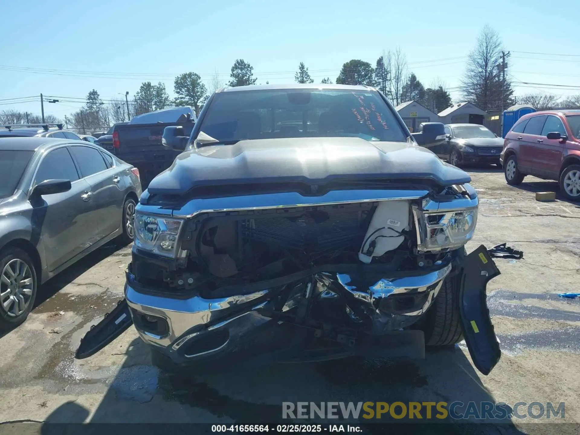 12 Photograph of a damaged car 1C6SRFFT4NN428027 RAM 1500 2022
