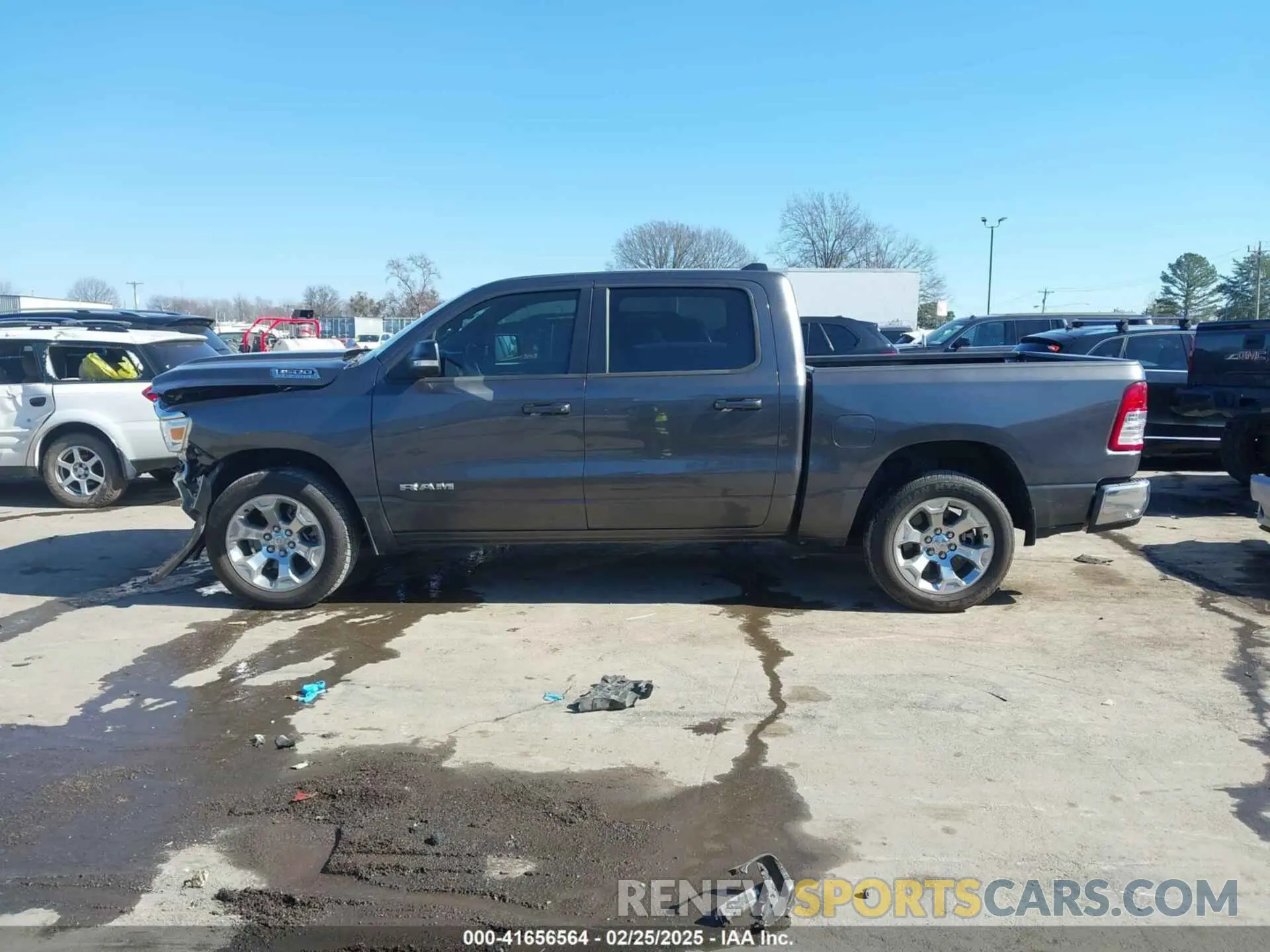 14 Photograph of a damaged car 1C6SRFFT4NN428027 RAM 1500 2022