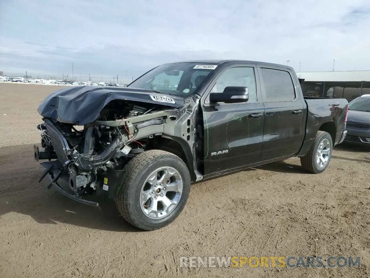 1 Photograph of a damaged car 1C6SRFFT5NN330737 RAM 1500 2022