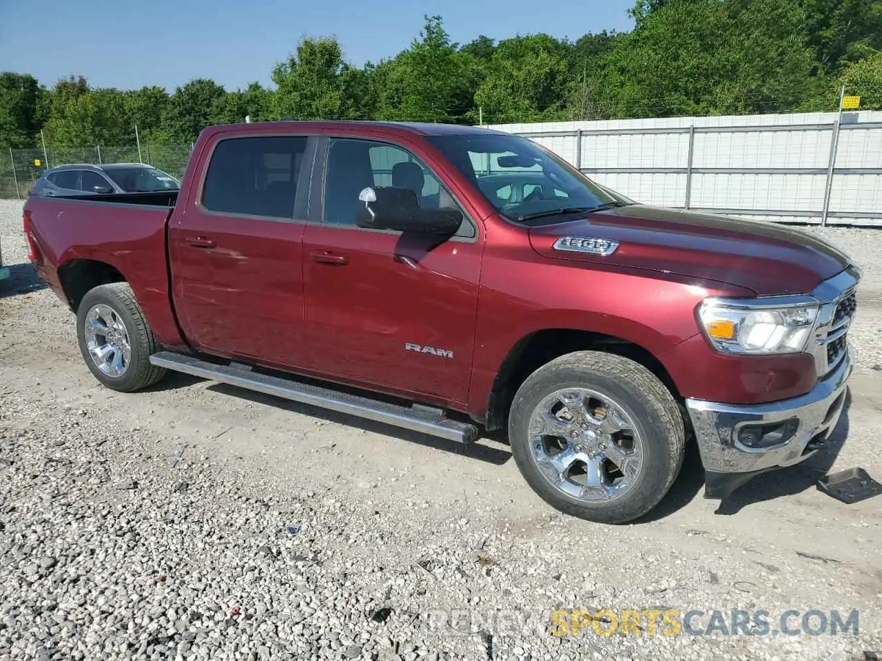 4 Photograph of a damaged car 1C6SRFFT6NN381504 RAM 1500 2022
