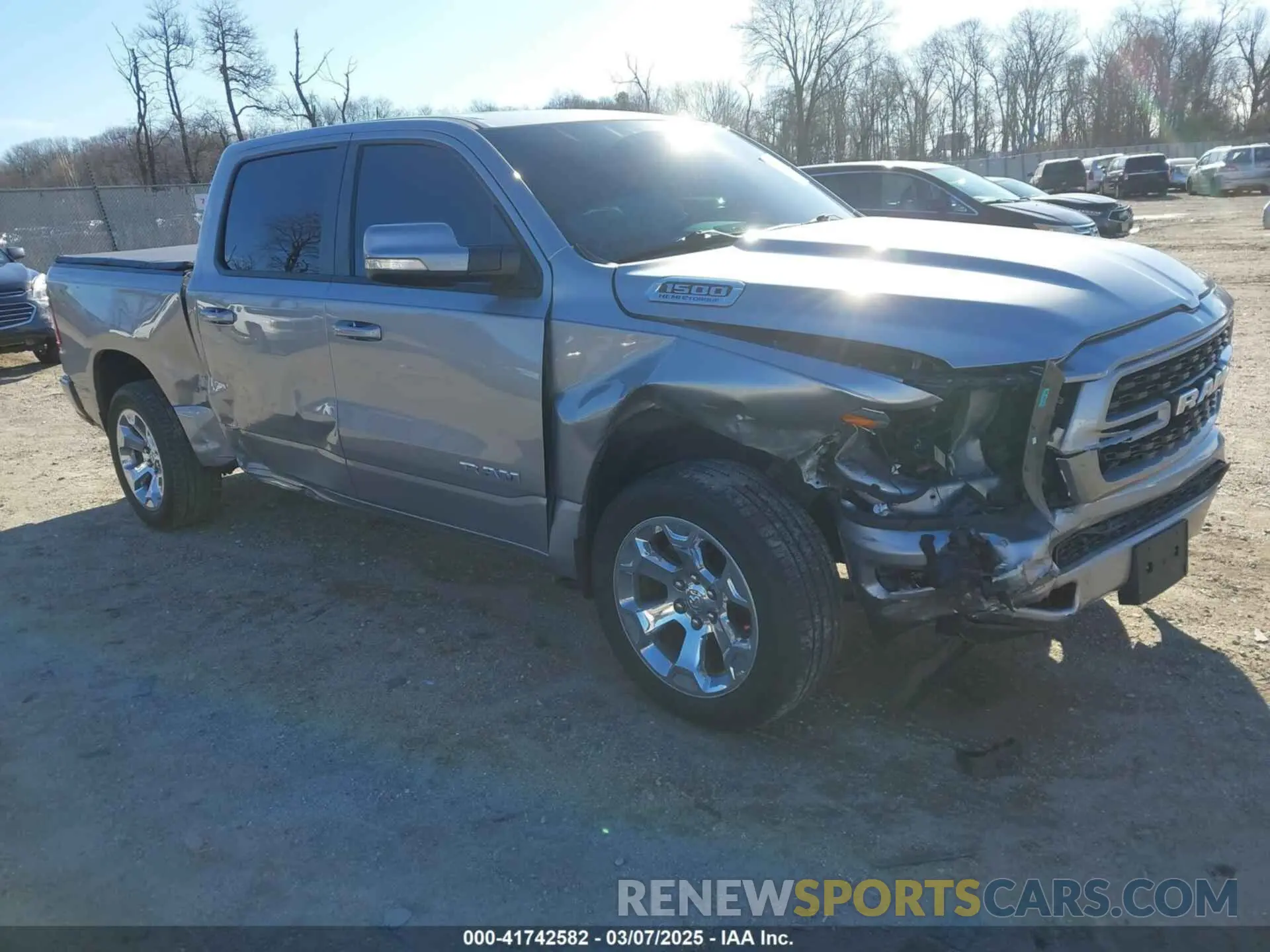 1 Photograph of a damaged car 1C6SRFFT6NN458310 RAM 1500 2022