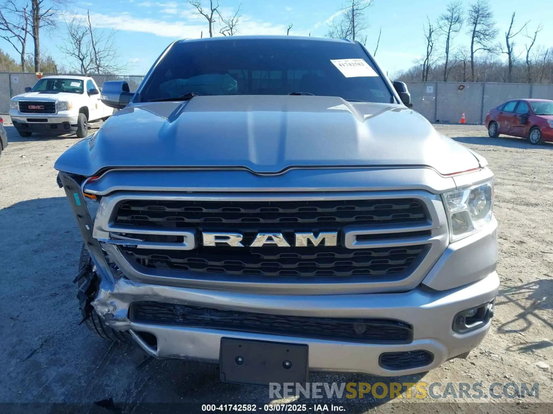 12 Photograph of a damaged car 1C6SRFFT6NN458310 RAM 1500 2022