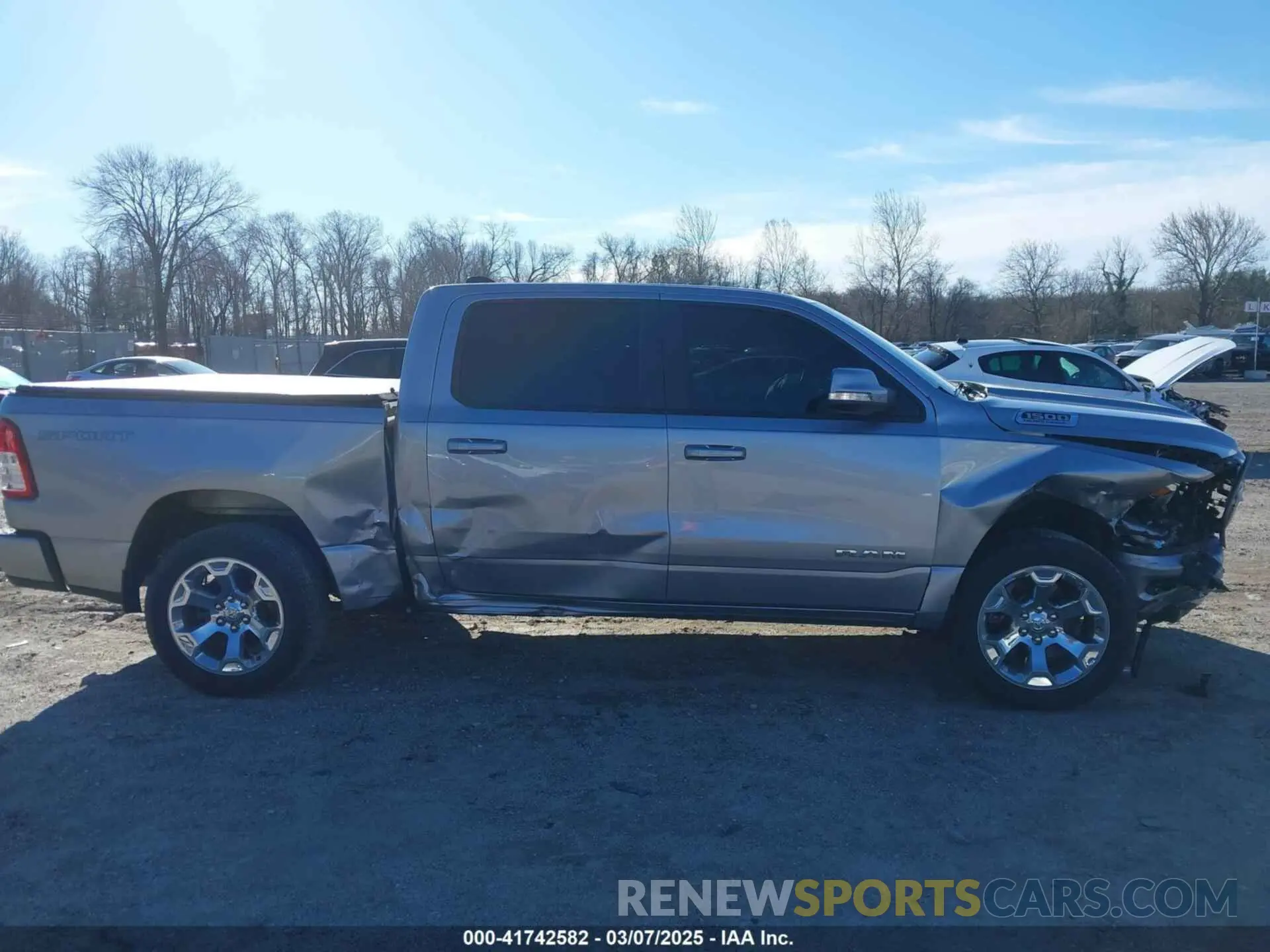13 Photograph of a damaged car 1C6SRFFT6NN458310 RAM 1500 2022
