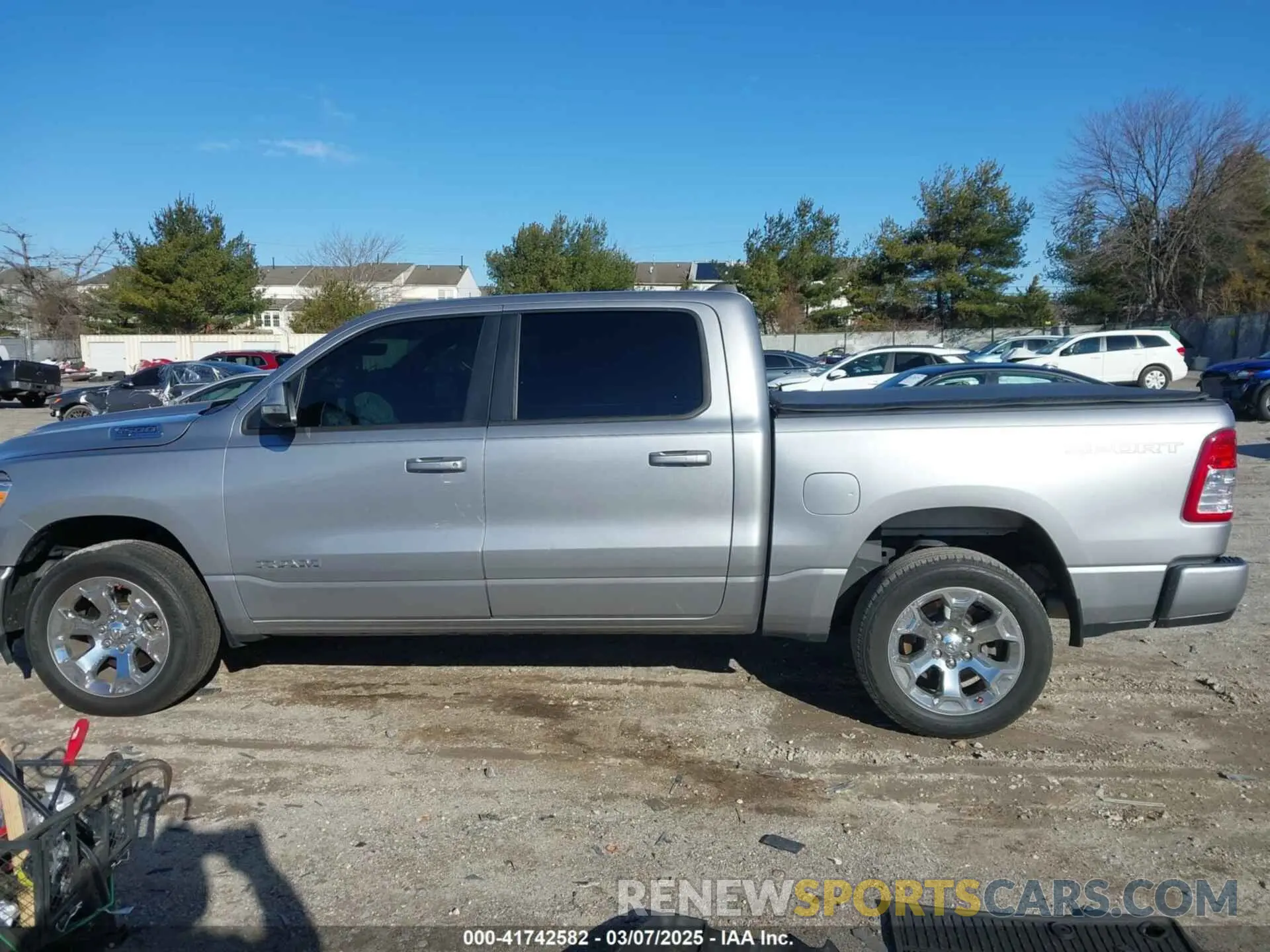 14 Photograph of a damaged car 1C6SRFFT6NN458310 RAM 1500 2022