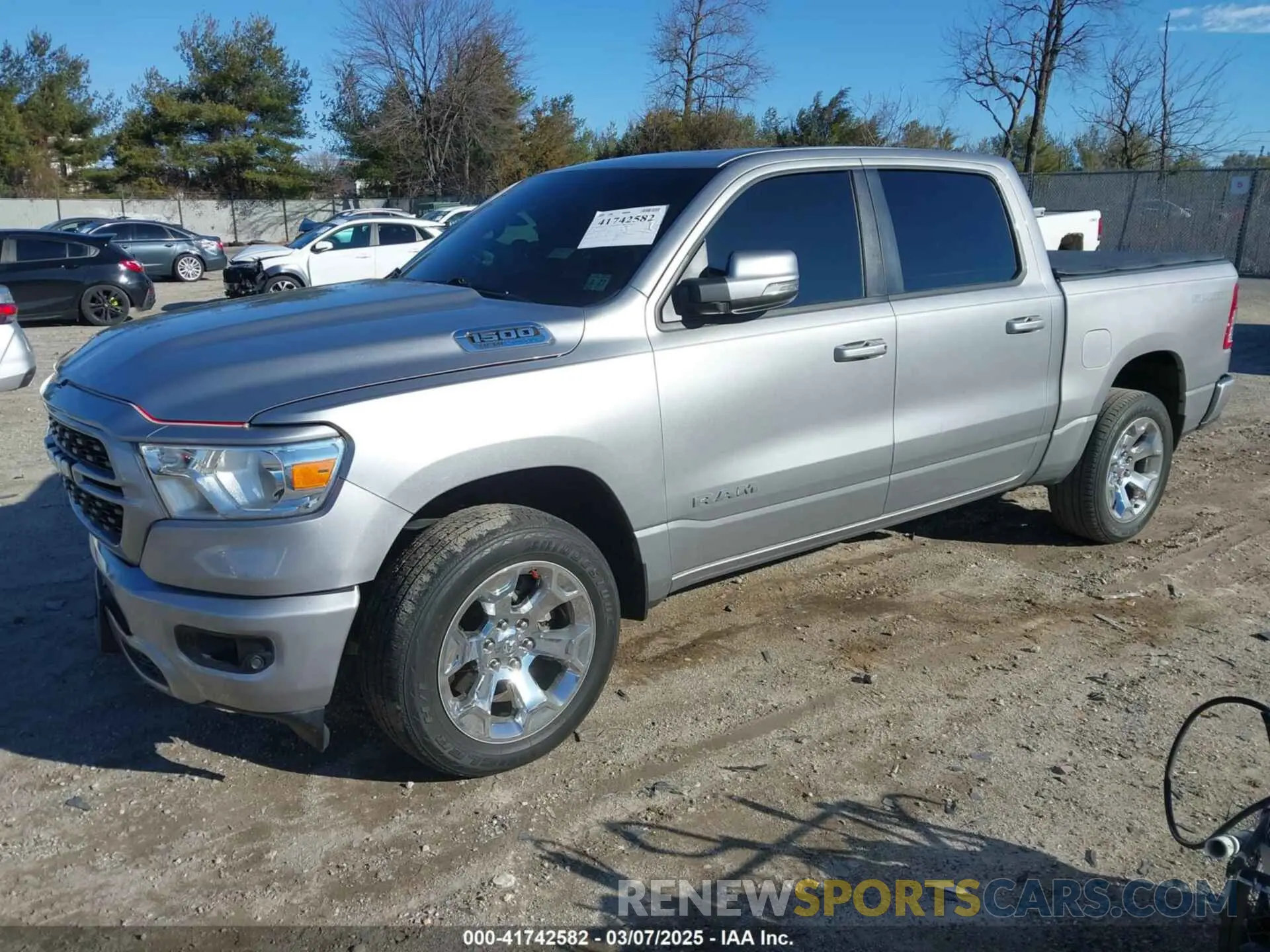 2 Photograph of a damaged car 1C6SRFFT6NN458310 RAM 1500 2022