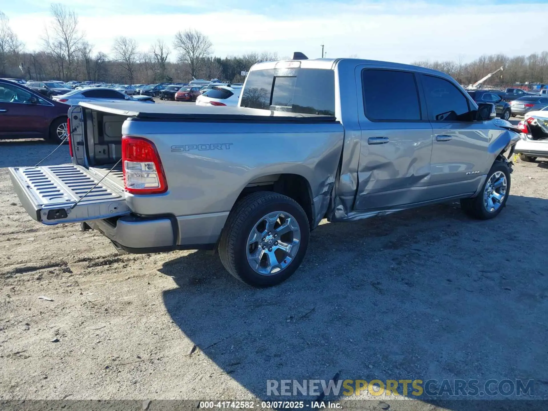 4 Photograph of a damaged car 1C6SRFFT6NN458310 RAM 1500 2022
