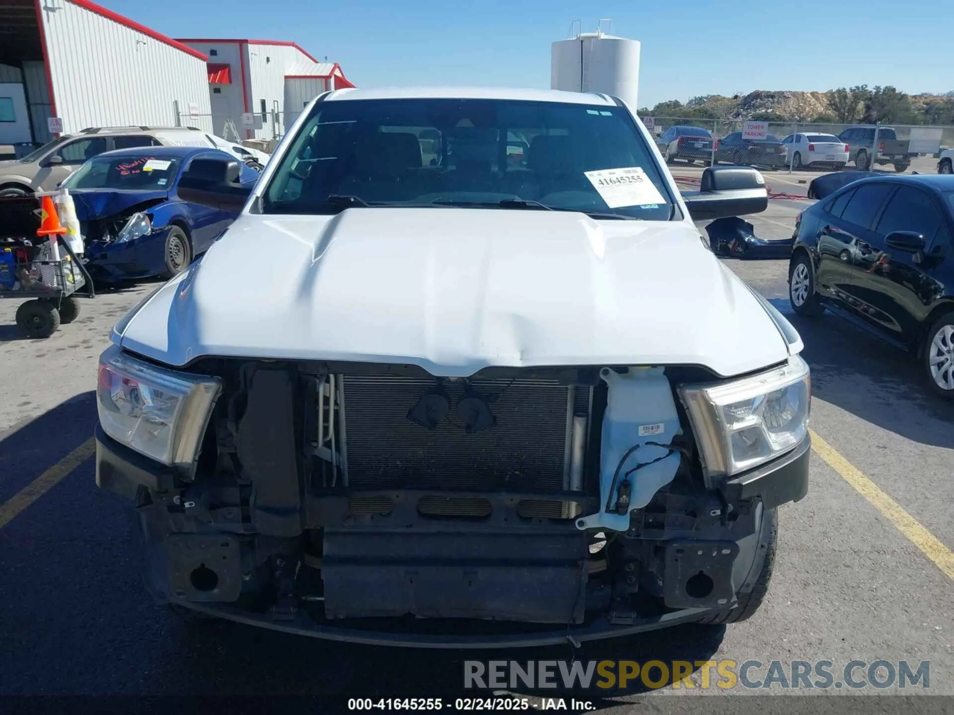 13 Photograph of a damaged car 1C6SRFFT7NN242269 RAM 1500 2022