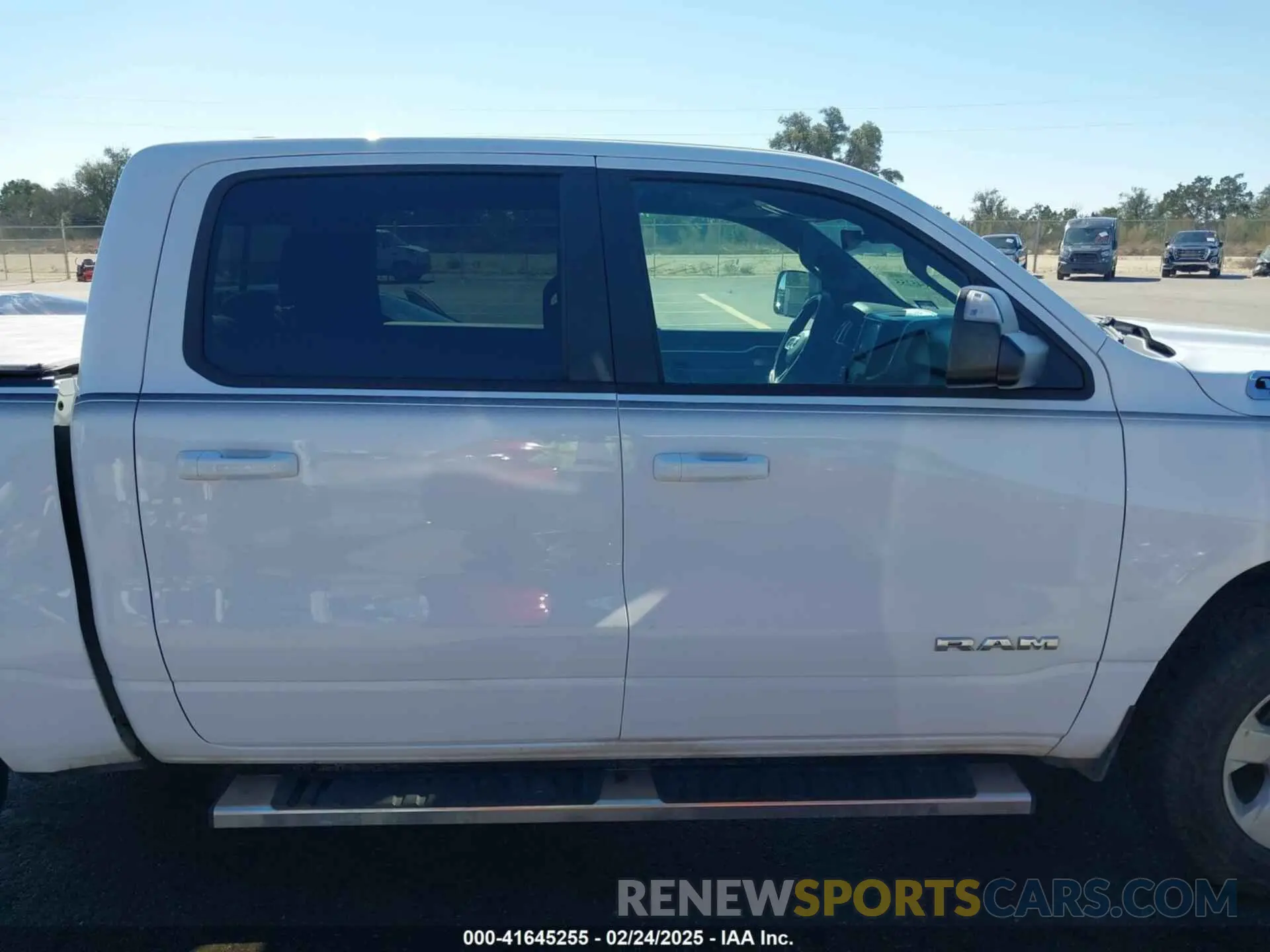 14 Photograph of a damaged car 1C6SRFFT7NN242269 RAM 1500 2022