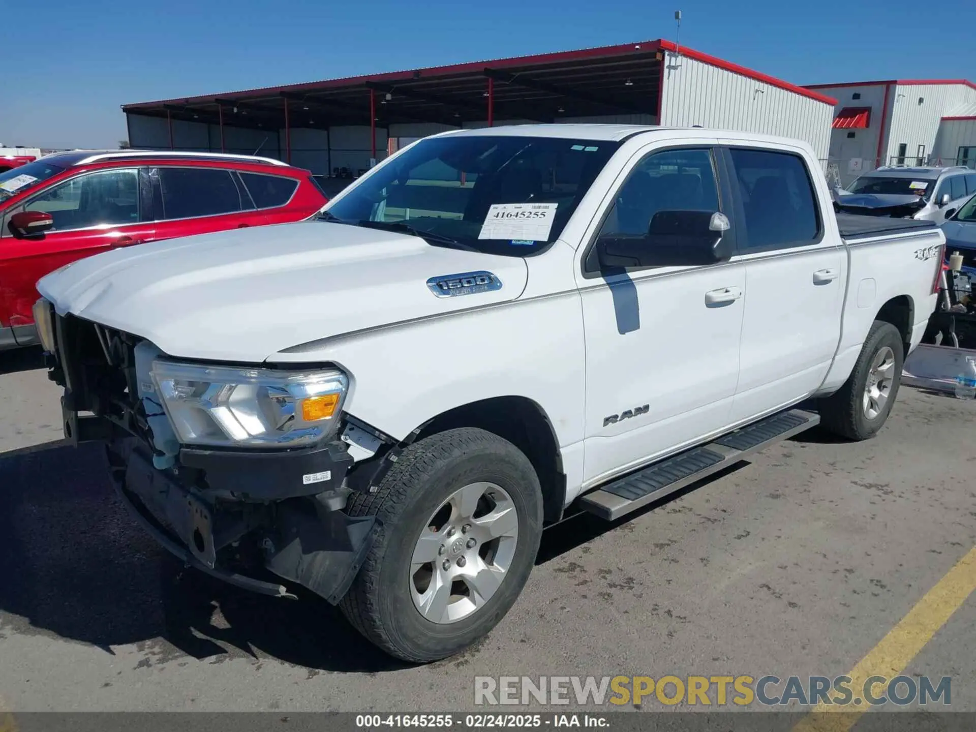 2 Photograph of a damaged car 1C6SRFFT7NN242269 RAM 1500 2022