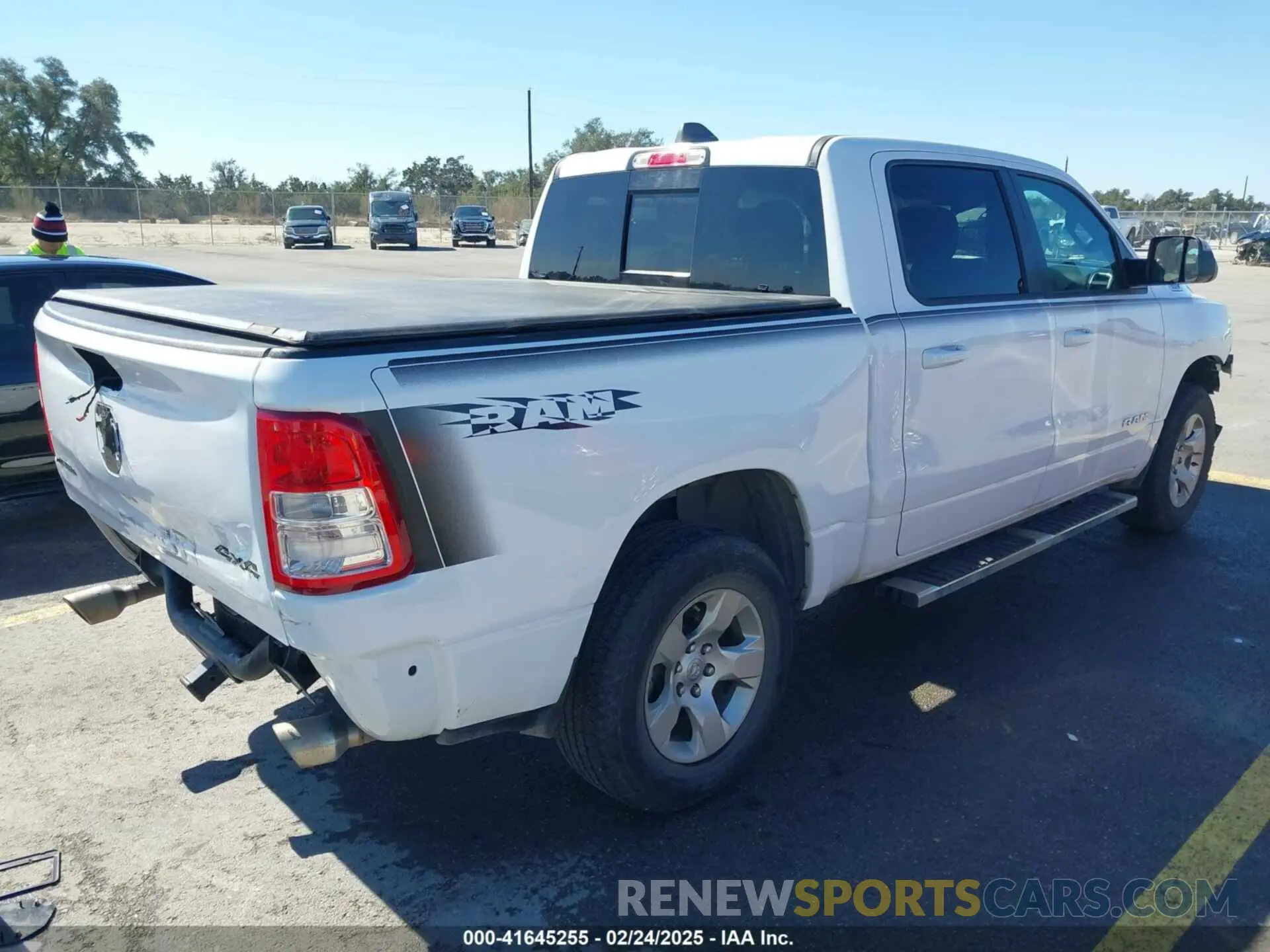 4 Photograph of a damaged car 1C6SRFFT7NN242269 RAM 1500 2022