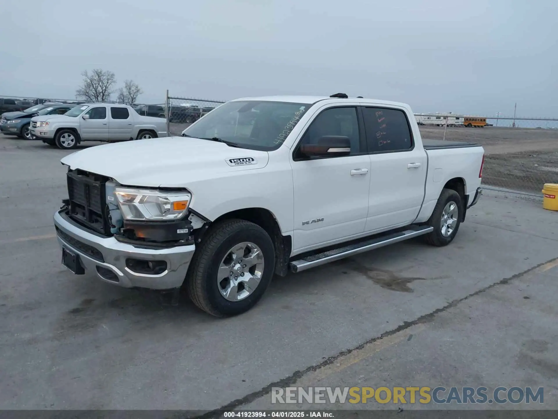 2 Photograph of a damaged car 1C6SRFFT7NN255569 RAM 1500 2022