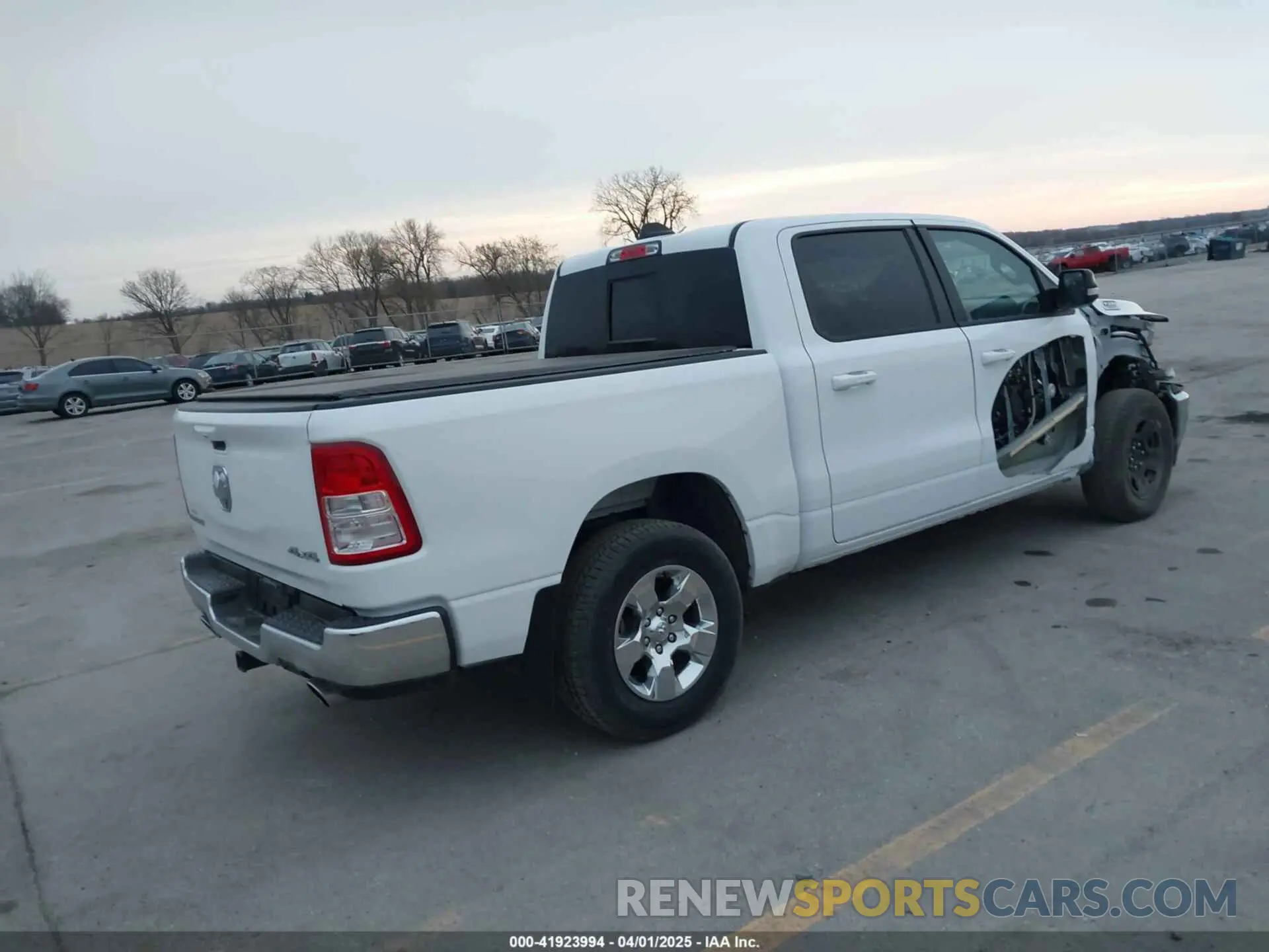 4 Photograph of a damaged car 1C6SRFFT7NN255569 RAM 1500 2022