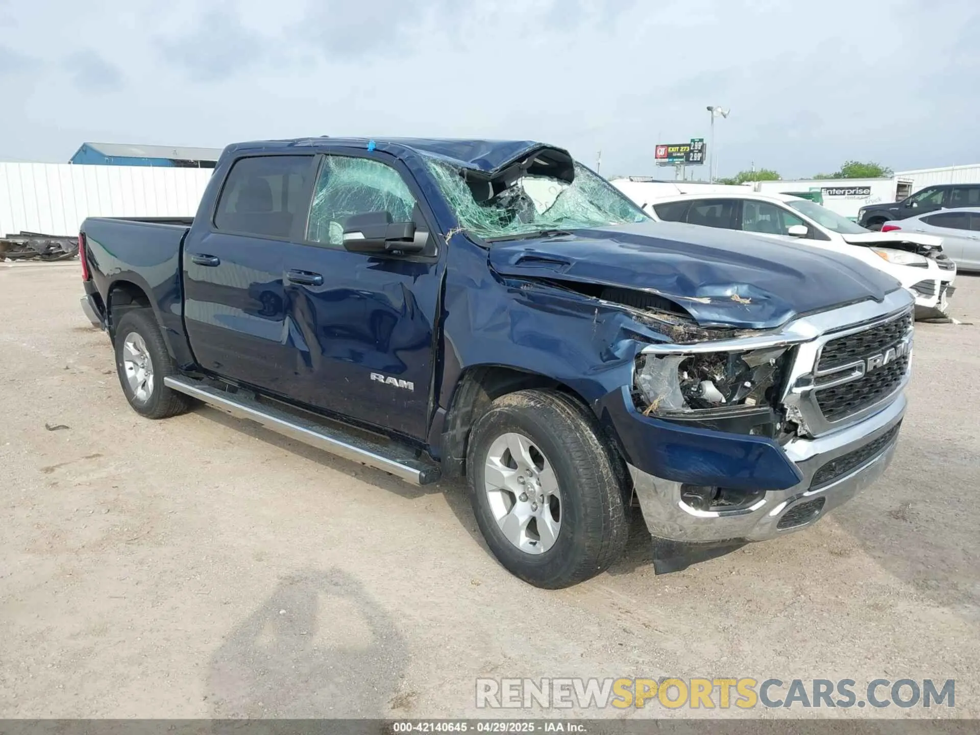 1 Photograph of a damaged car 1C6SRFFT7NN415143 RAM 1500 2022