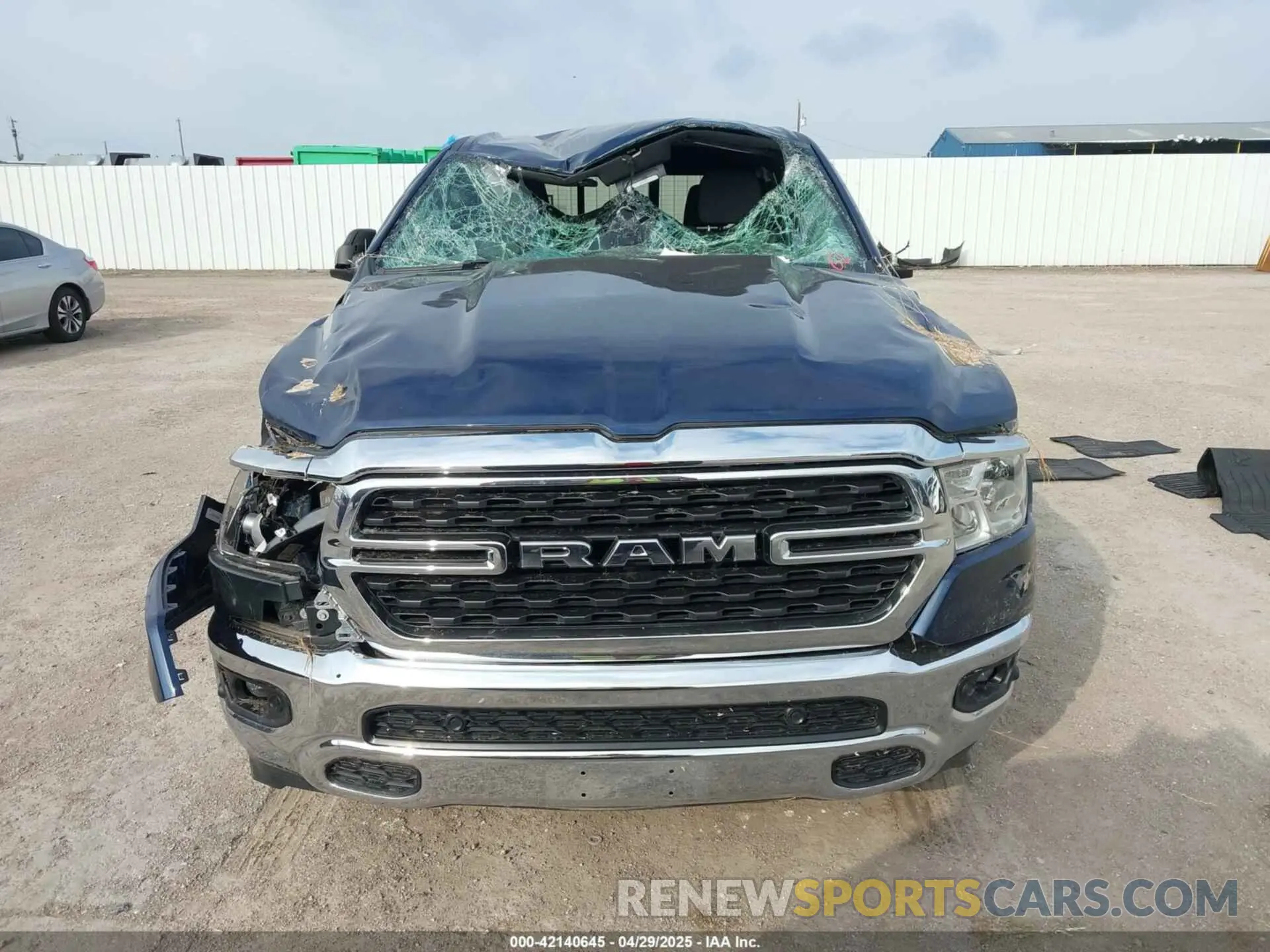 11 Photograph of a damaged car 1C6SRFFT7NN415143 RAM 1500 2022