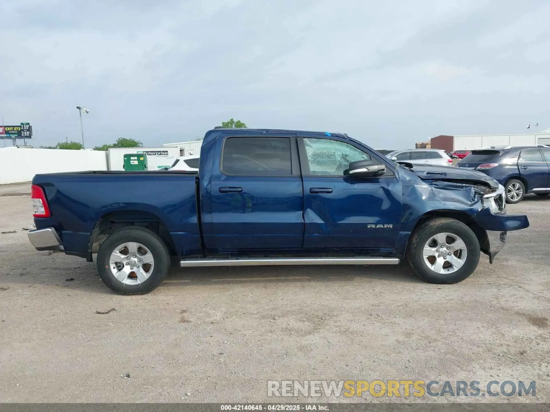 12 Photograph of a damaged car 1C6SRFFT7NN415143 RAM 1500 2022