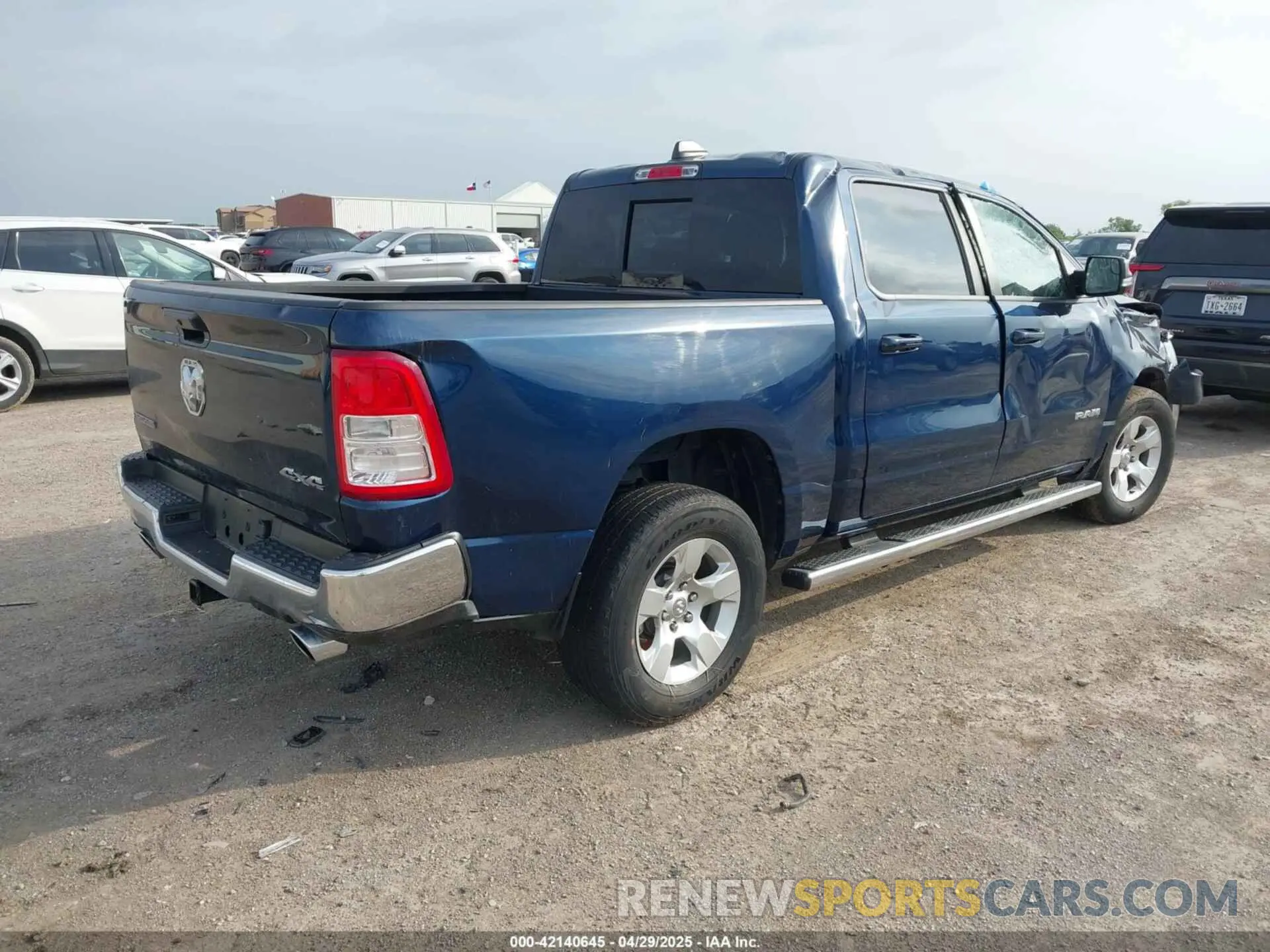 4 Photograph of a damaged car 1C6SRFFT7NN415143 RAM 1500 2022