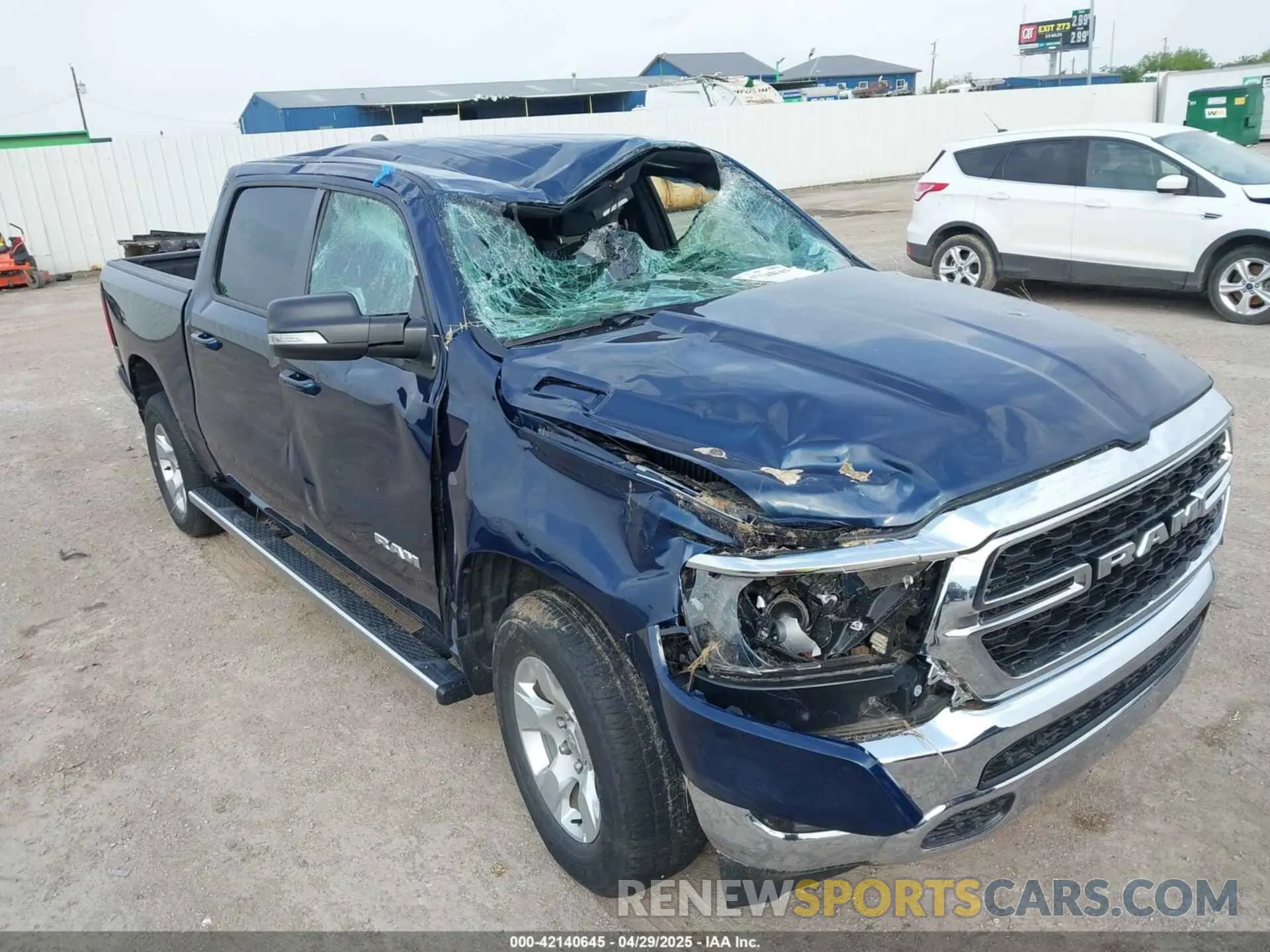 6 Photograph of a damaged car 1C6SRFFT7NN415143 RAM 1500 2022