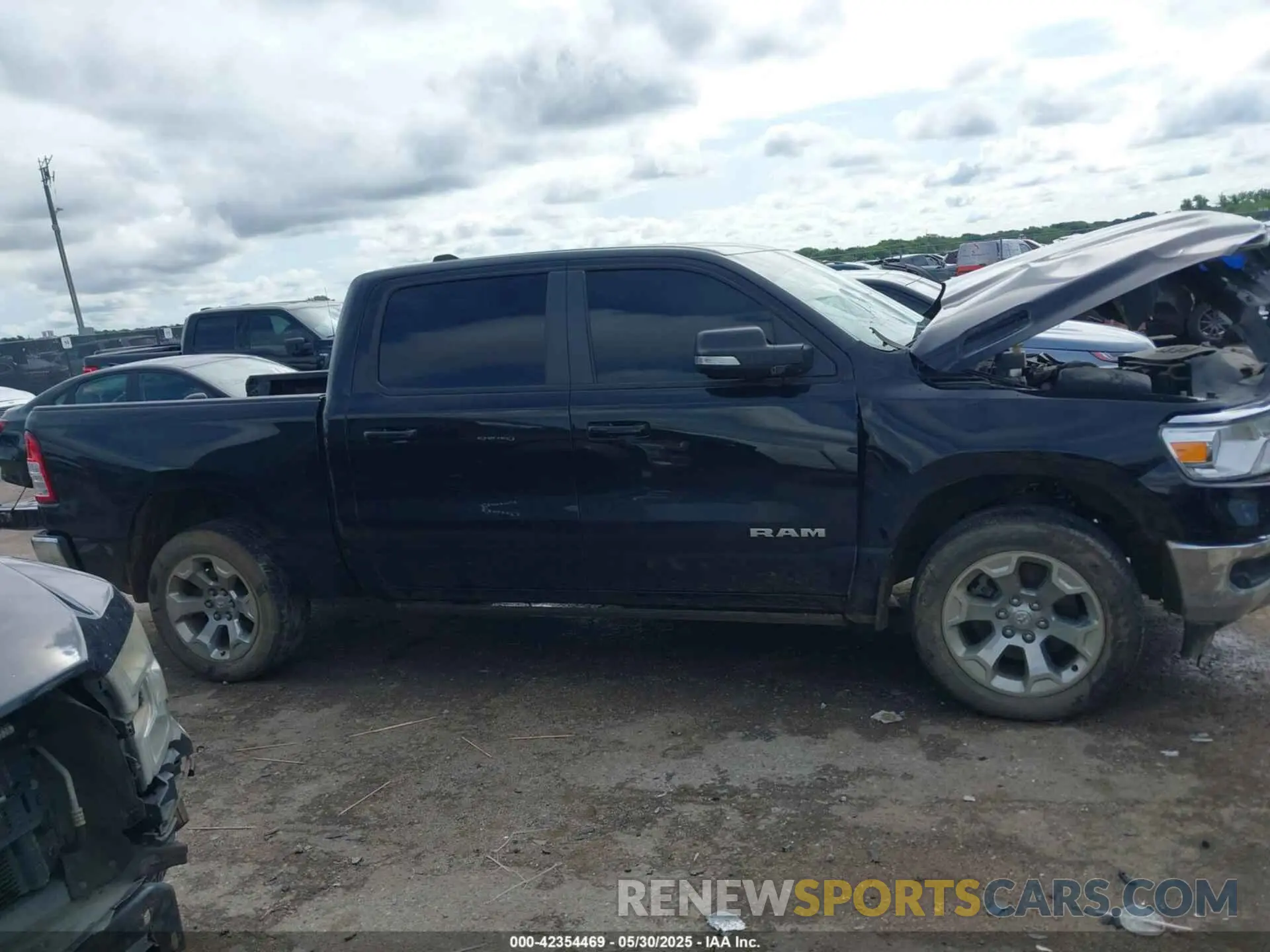 14 Photograph of a damaged car 1C6SRFFT7NN460826 RAM 1500 2022