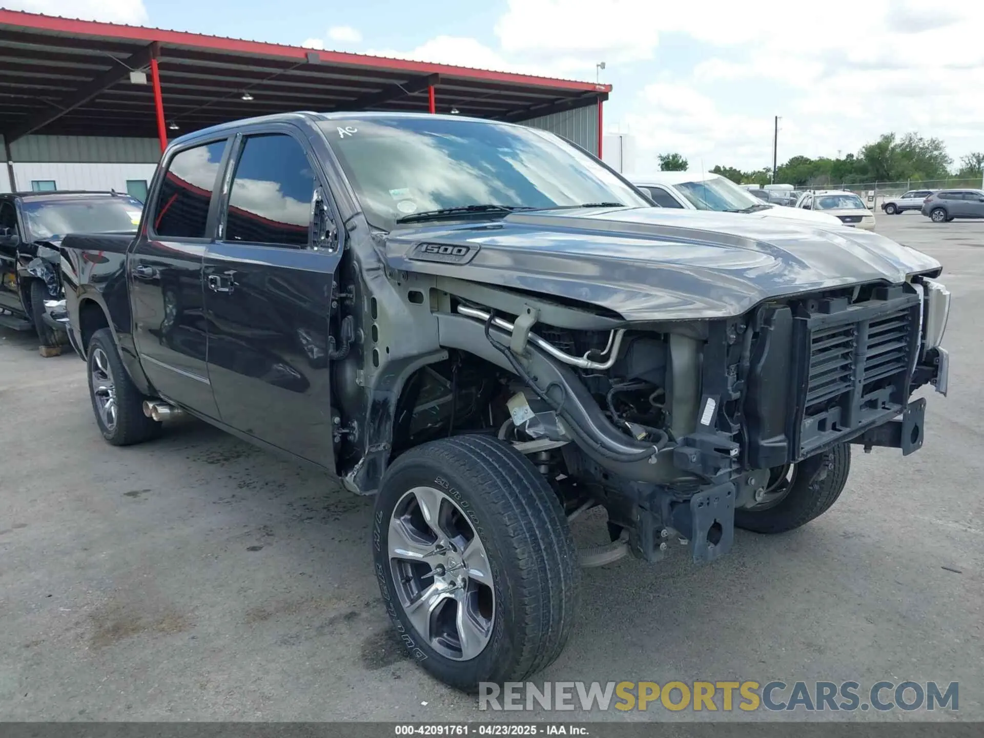 1 Photograph of a damaged car 1C6SRFFT8NN137742 RAM 1500 2022