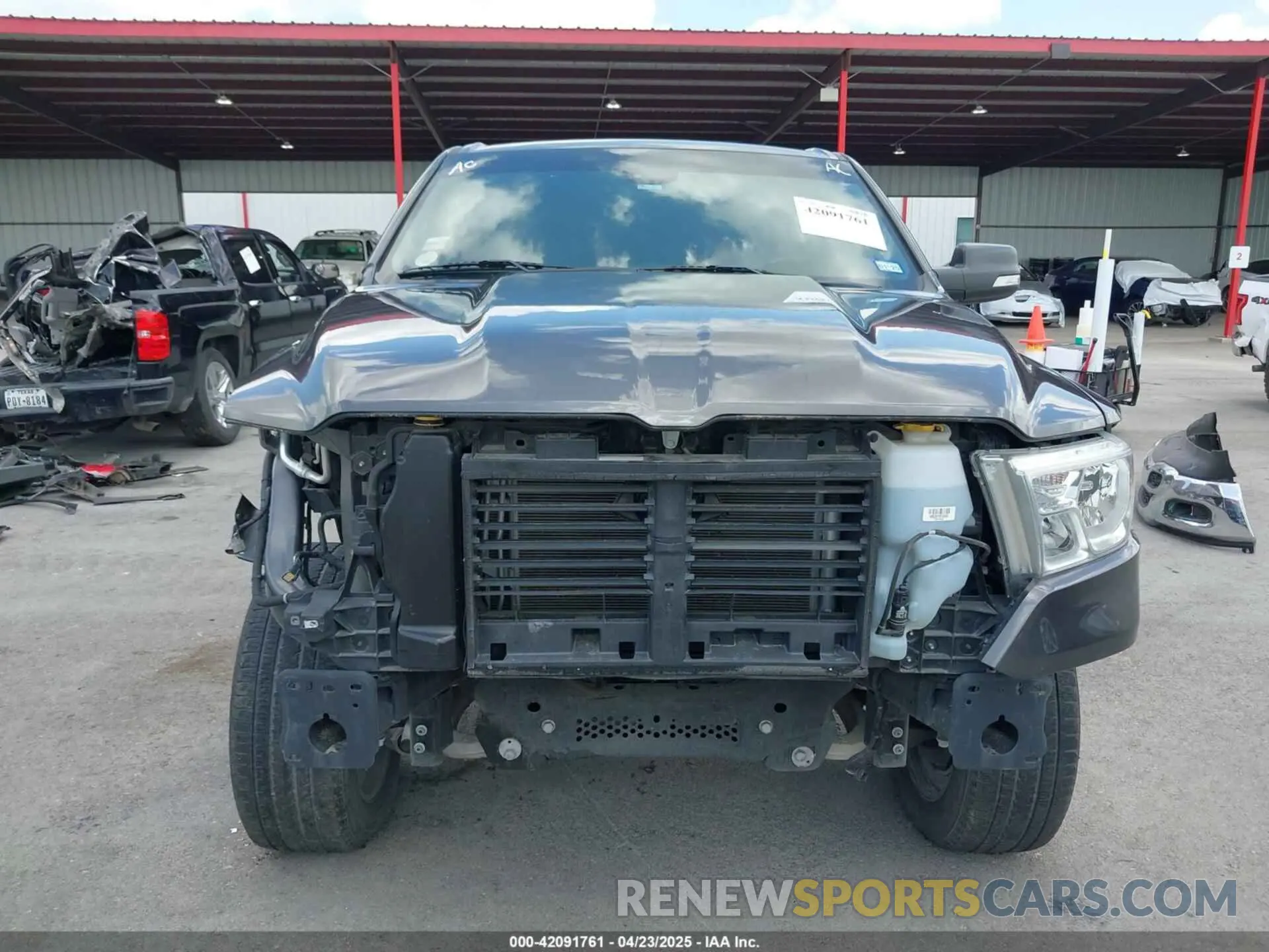 13 Photograph of a damaged car 1C6SRFFT8NN137742 RAM 1500 2022