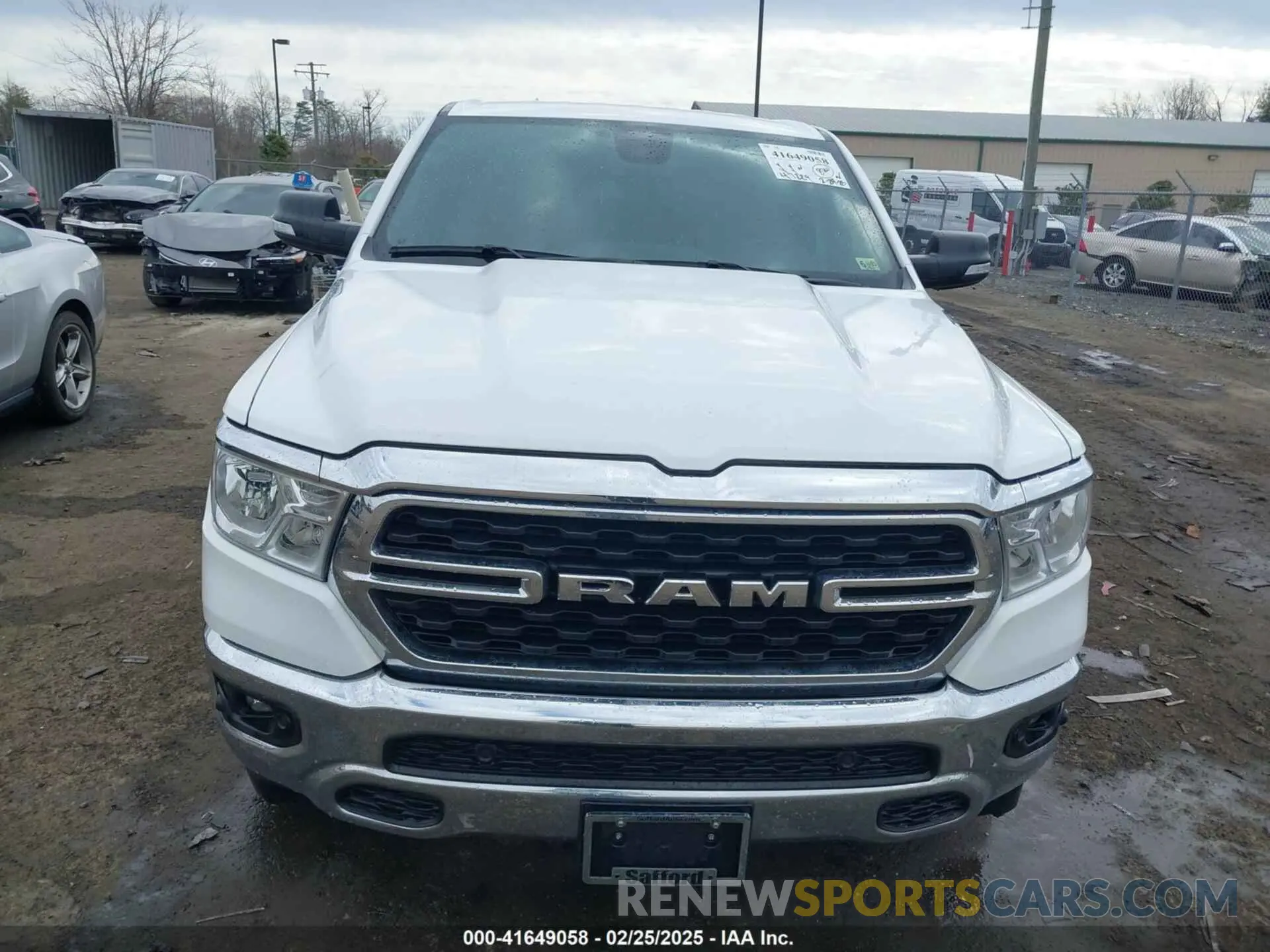 13 Photograph of a damaged car 1C6SRFFT8NN405933 RAM 1500 2022