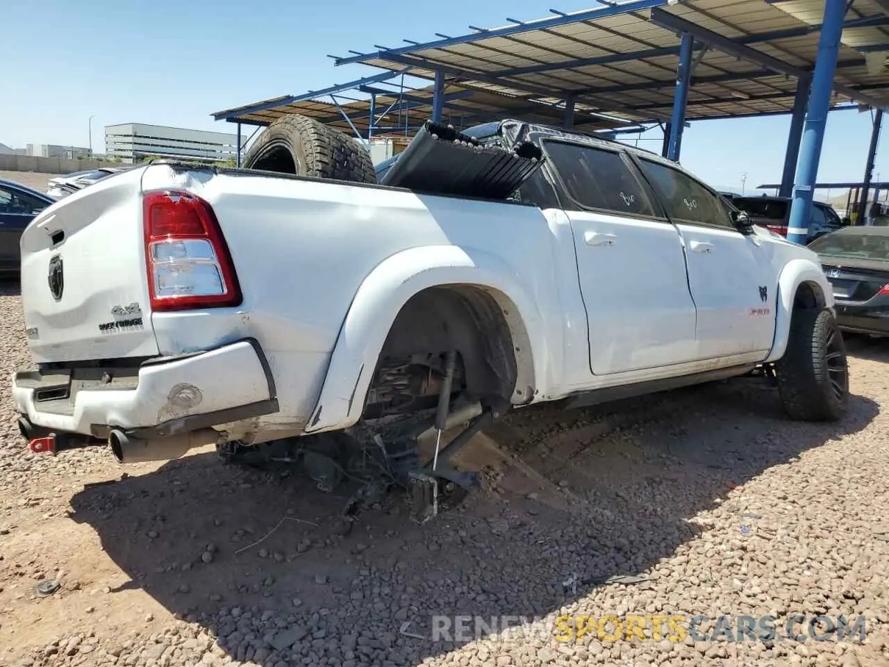 3 Photograph of a damaged car 1C6SRFFT9NN194208 RAM 1500 2022