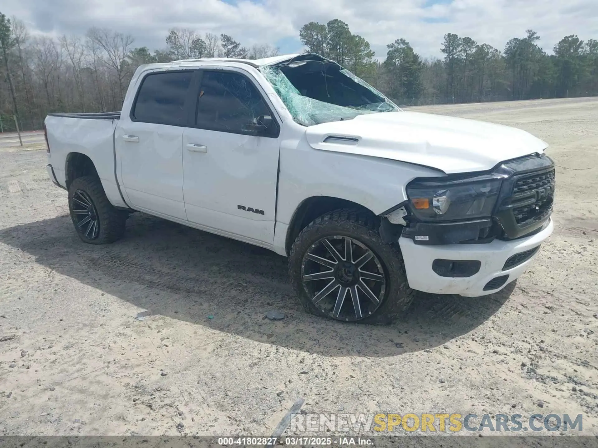 1 Photograph of a damaged car 1C6SRFFT9NN222928 RAM 1500 2022