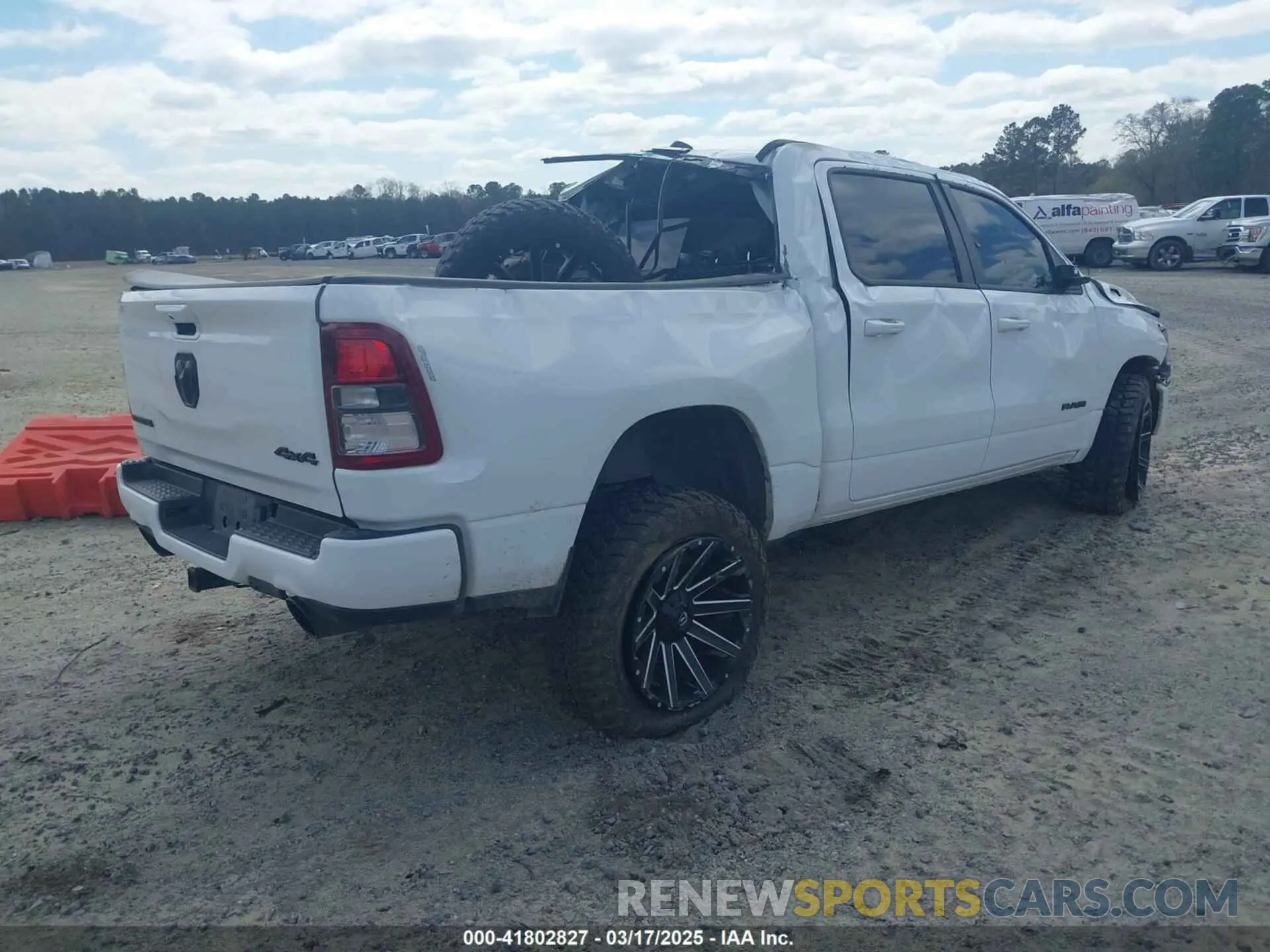 4 Photograph of a damaged car 1C6SRFFT9NN222928 RAM 1500 2022