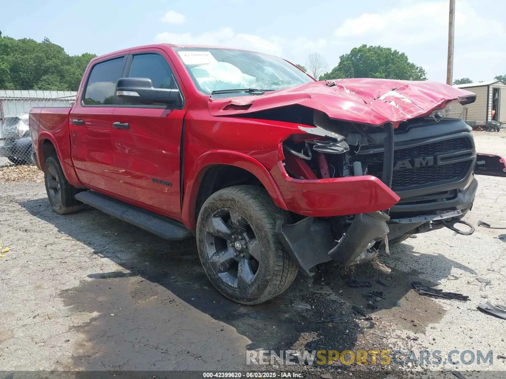 1 Photograph of a damaged car 1C6SRFFTXNN243352 RAM 1500 2022