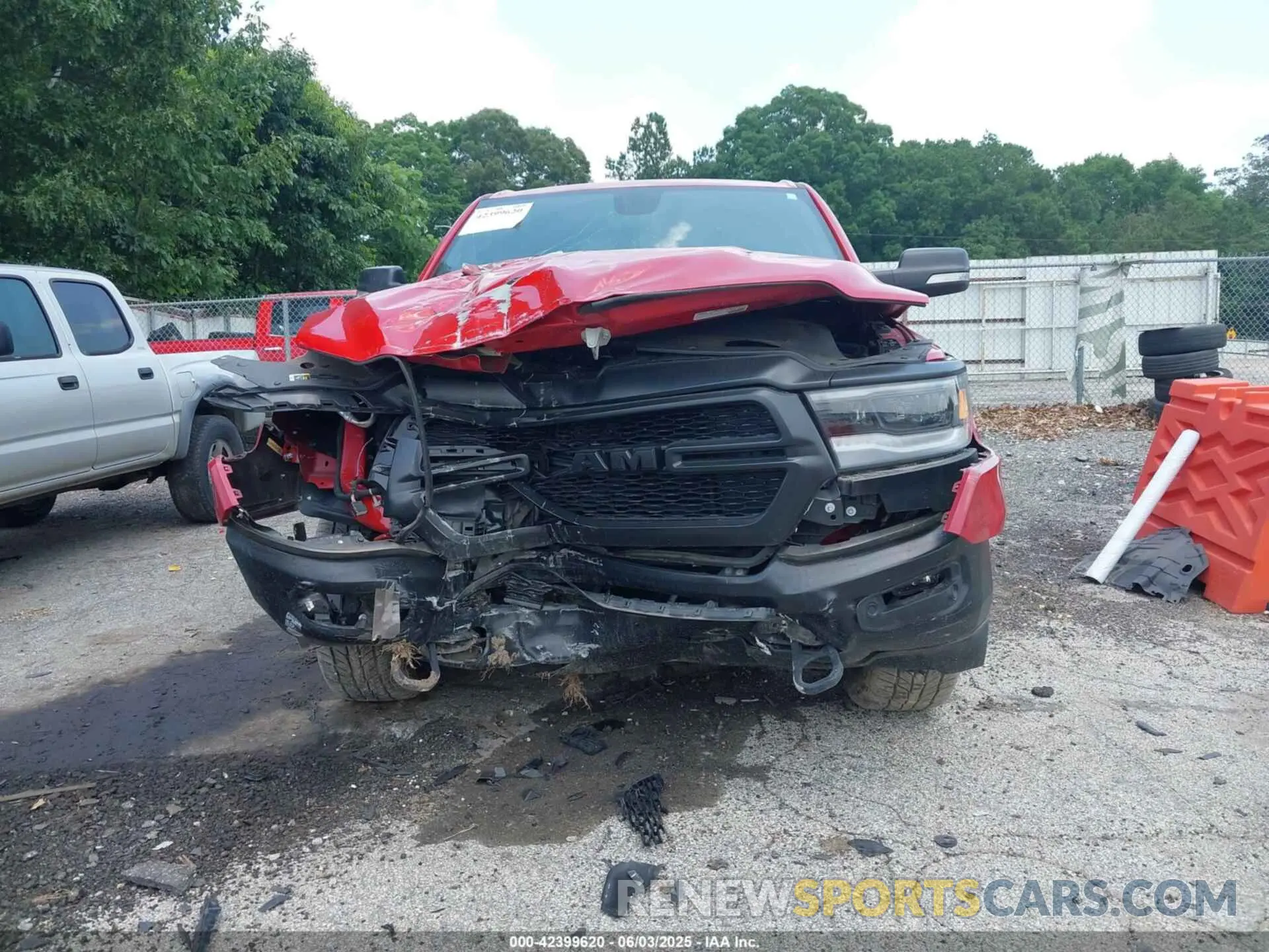 12 Photograph of a damaged car 1C6SRFFTXNN243352 RAM 1500 2022