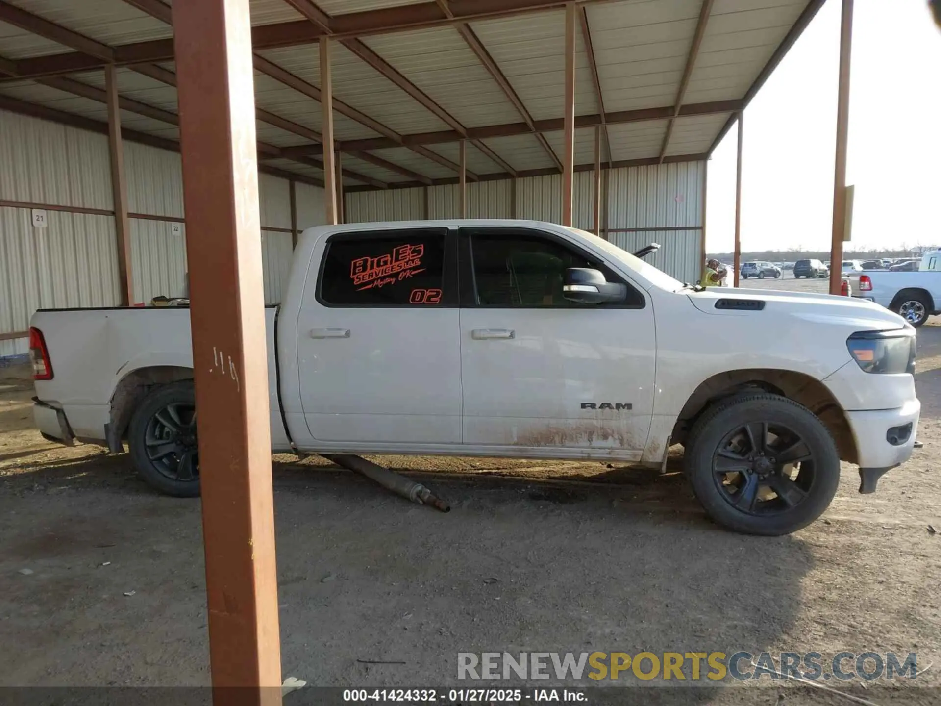 13 Photograph of a damaged car 1C6SRFFTXNN351308 RAM 1500 2022