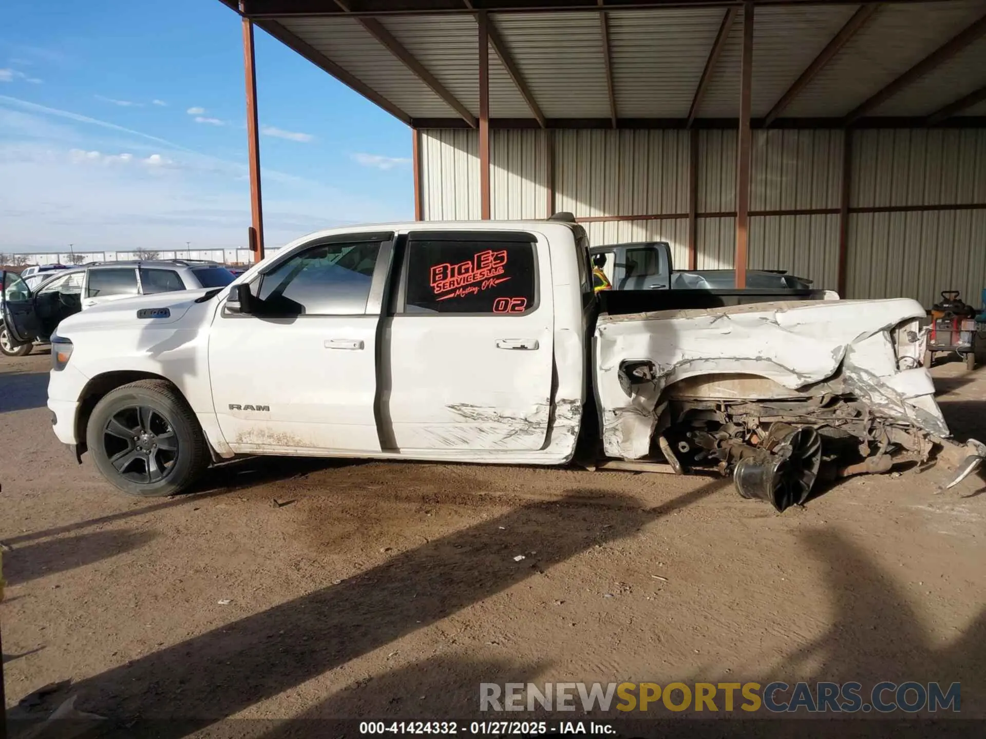 14 Photograph of a damaged car 1C6SRFFTXNN351308 RAM 1500 2022