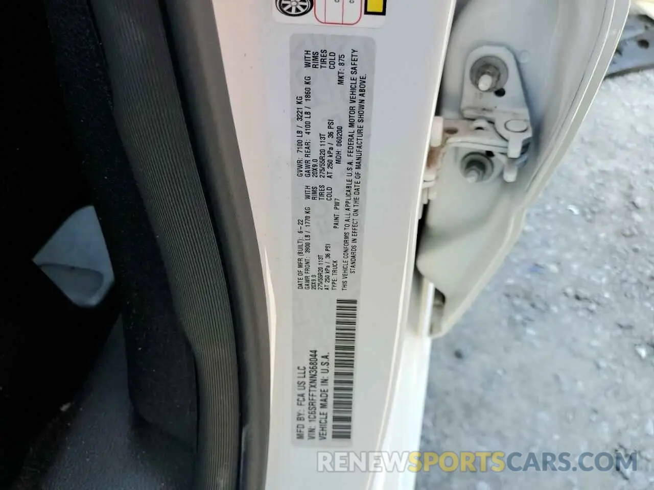 14 Photograph of a damaged car 1C6SRFFTXNN368044 RAM 1500 2022