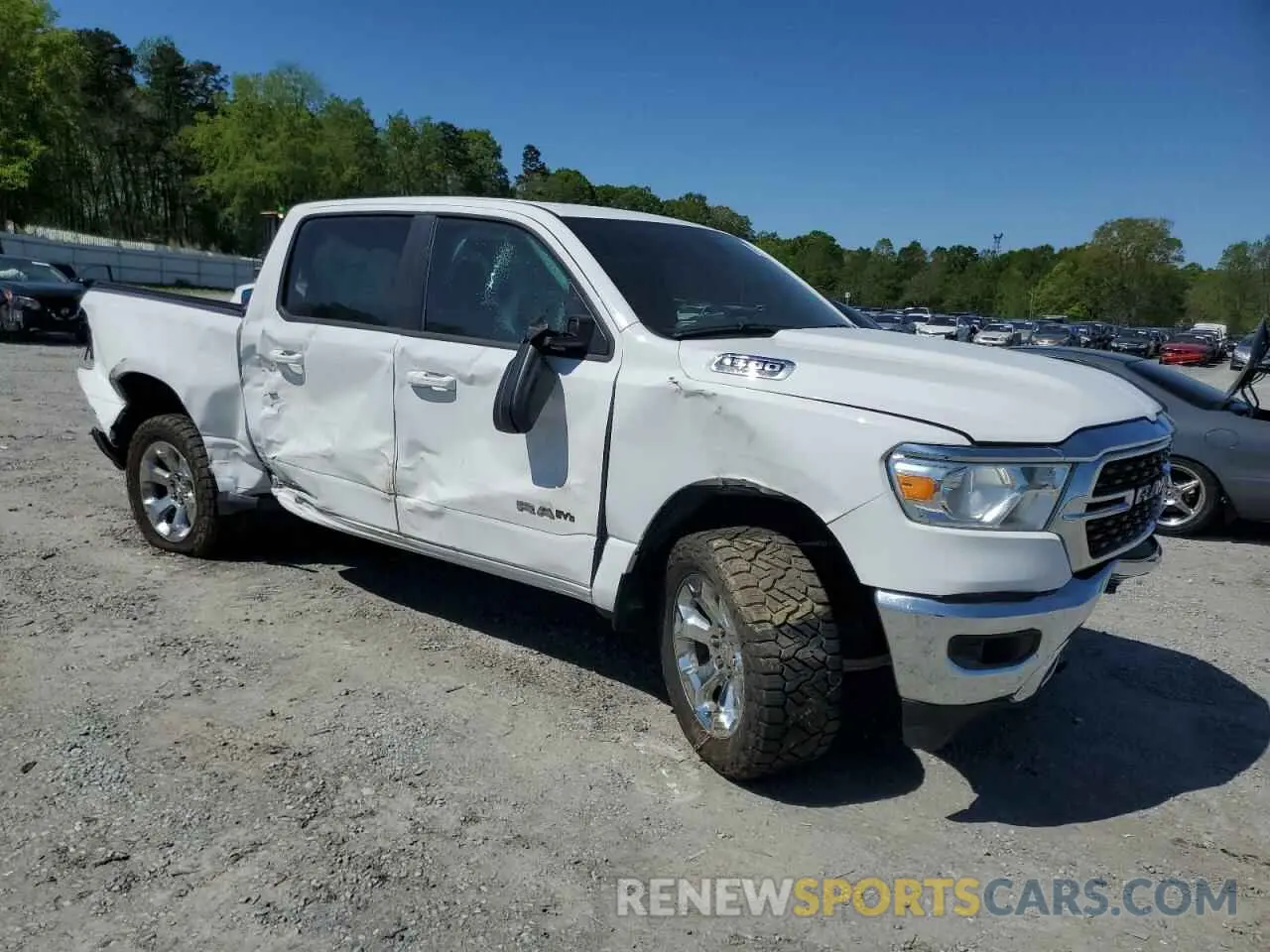 4 Photograph of a damaged car 1C6SRFFTXNN368044 RAM 1500 2022