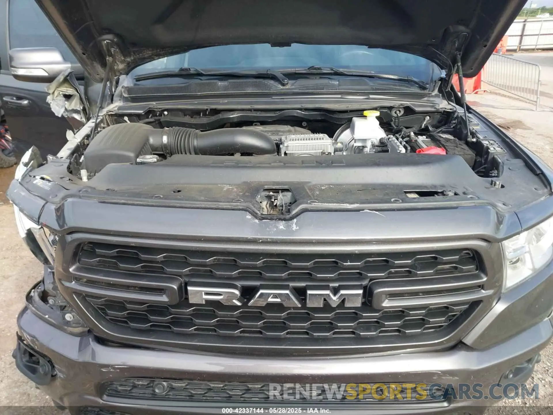 10 Photograph of a damaged car 1C6SRFFTXNN395065 RAM 1500 2022