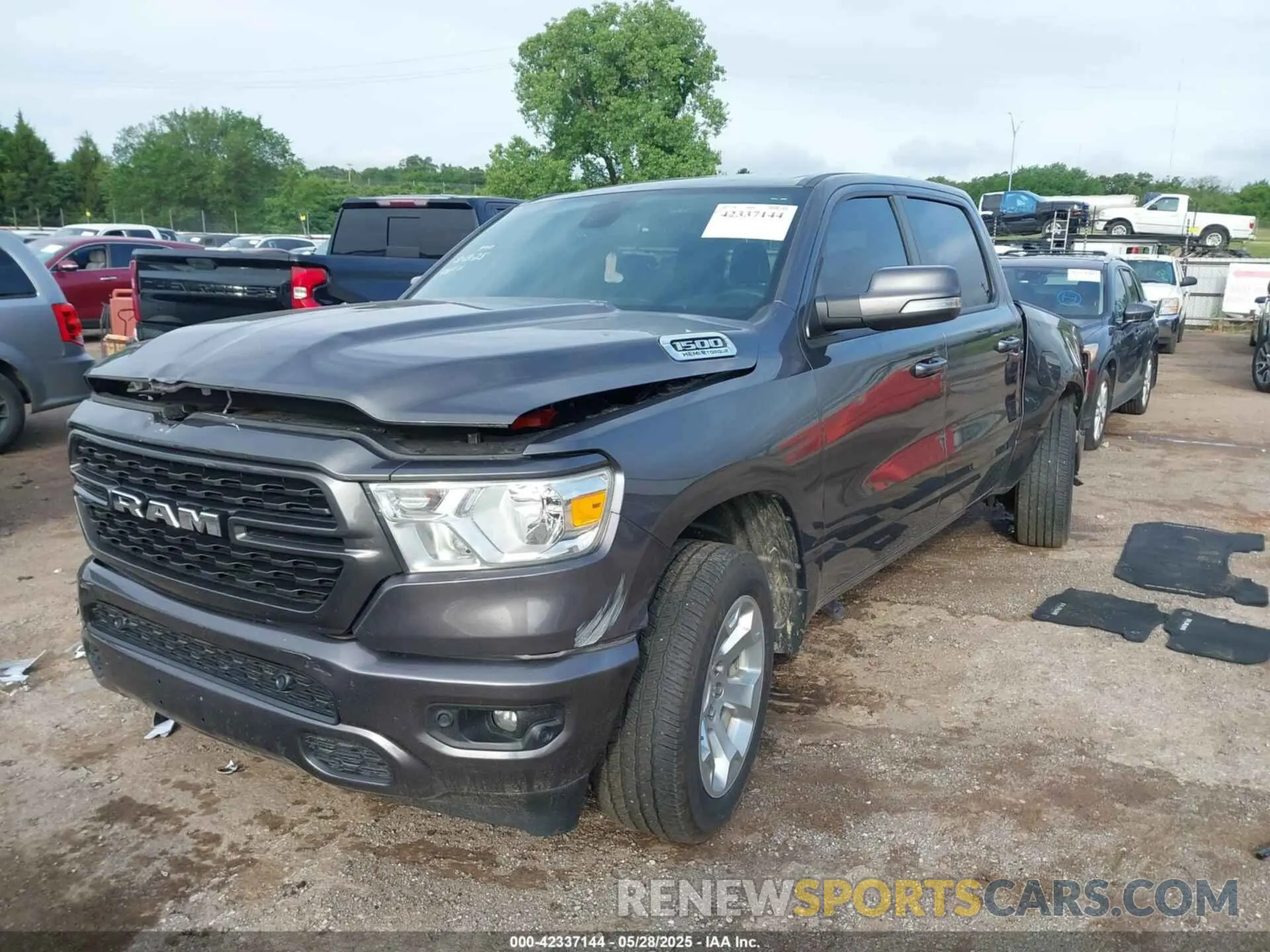 2 Photograph of a damaged car 1C6SRFFTXNN395065 RAM 1500 2022