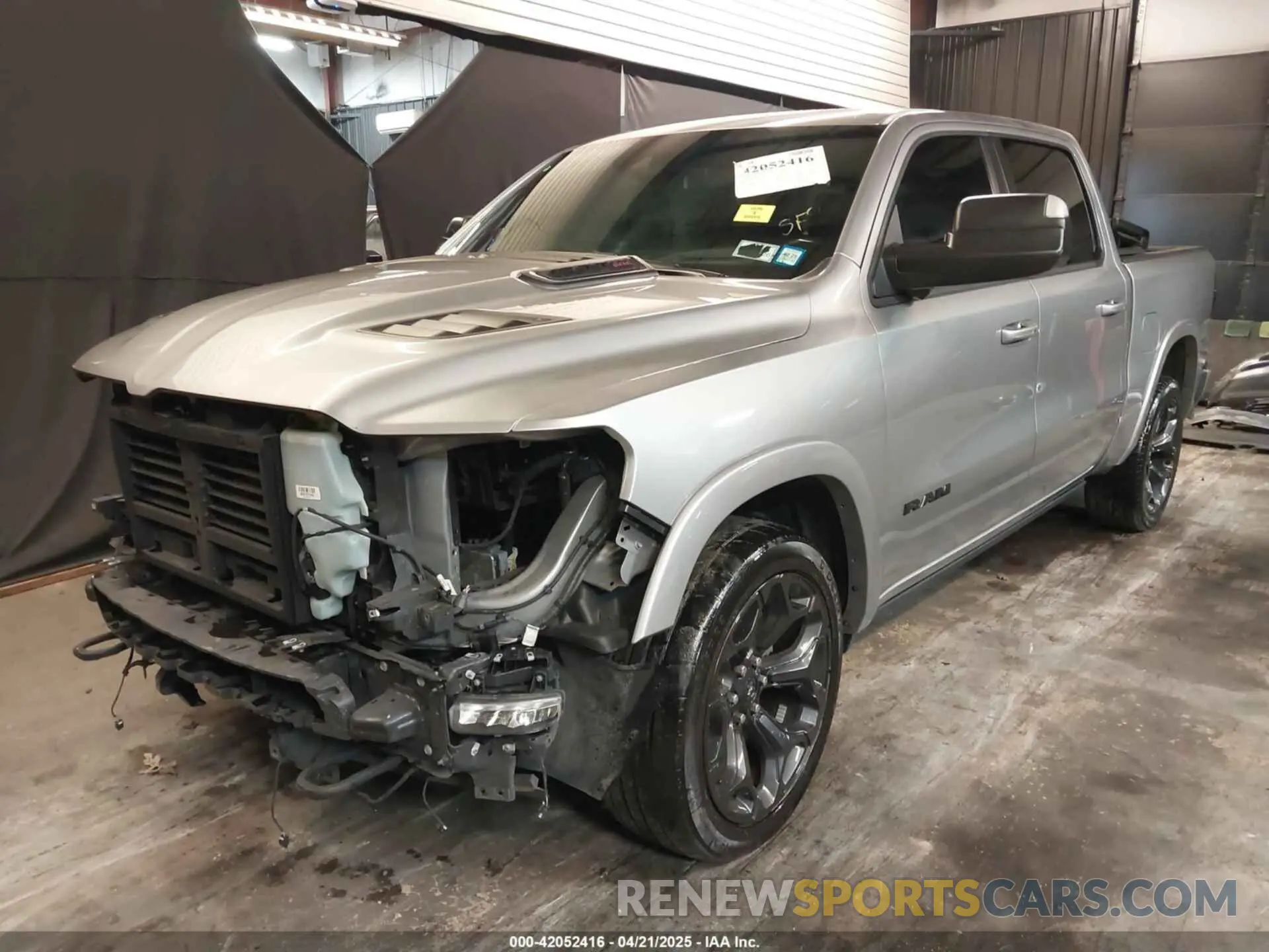 2 Photograph of a damaged car 1C6SRFHM1NN211394 RAM 1500 2022
