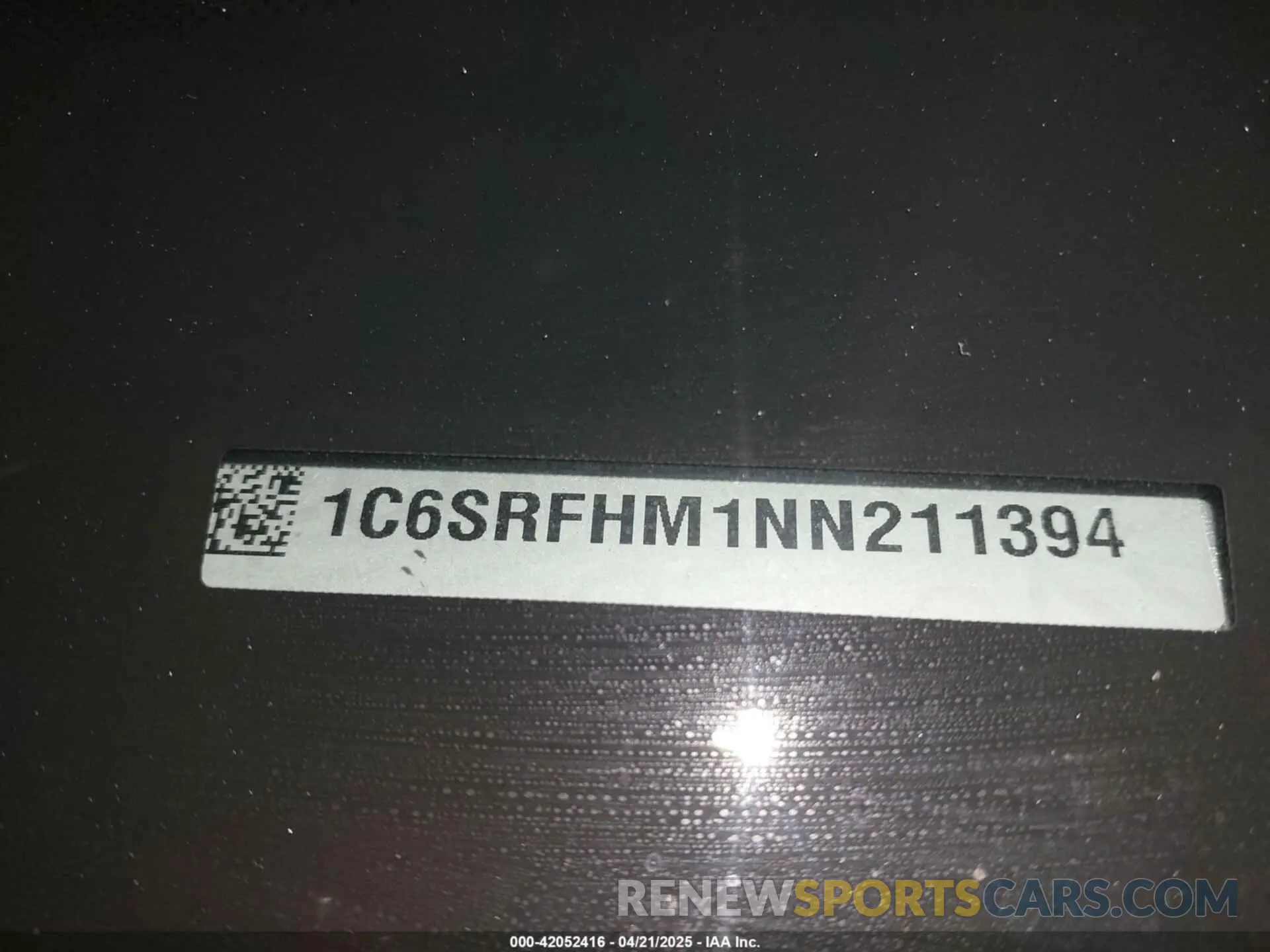21 Photograph of a damaged car 1C6SRFHM1NN211394 RAM 1500 2022