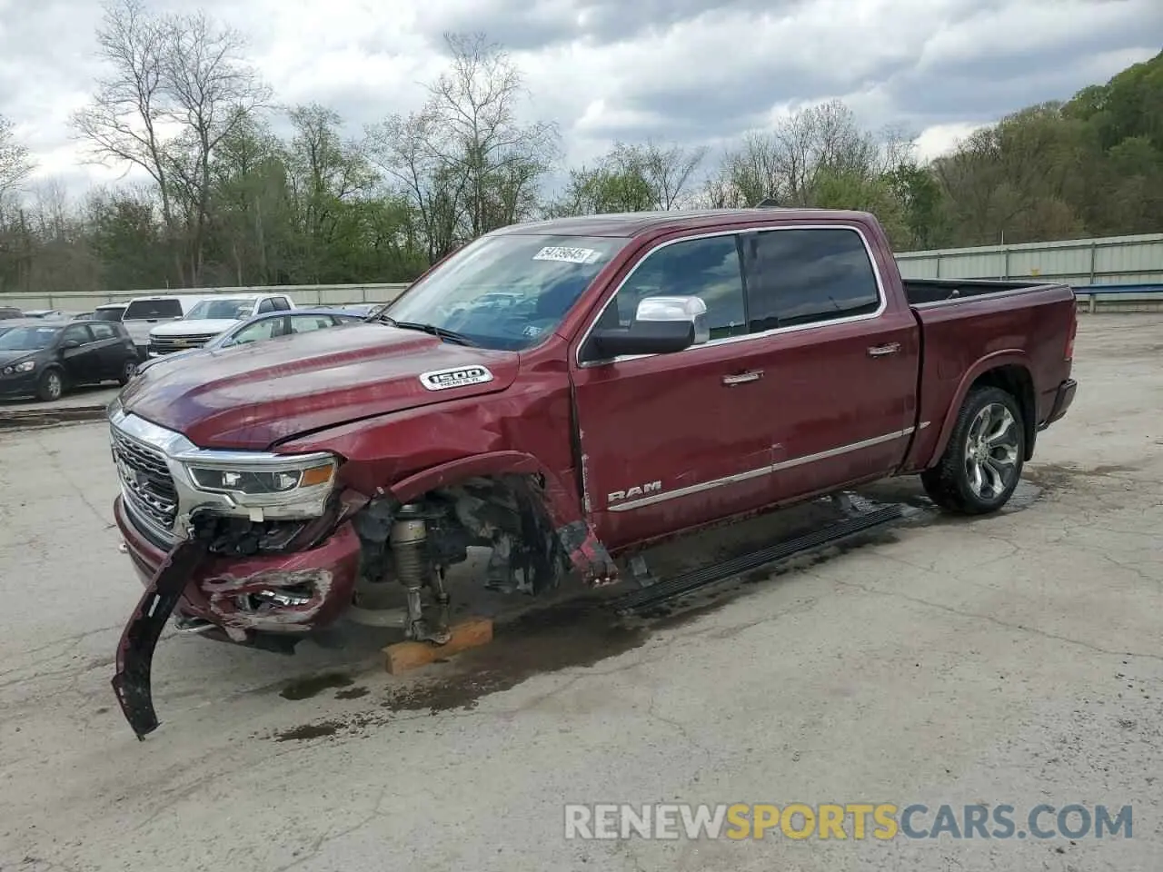 1 Photograph of a damaged car 1C6SRFHT0NN307945 RAM 1500 2022