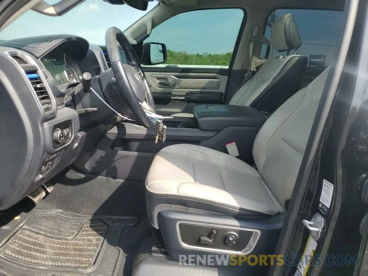 7 Photograph of a damaged car 1C6SRFHT3NN109831 RAM 1500 2022