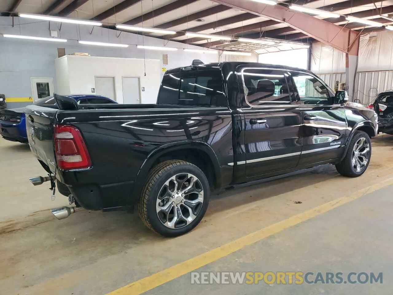 3 Photograph of a damaged car 1C6SRFHT6NN171384 RAM 1500 2022