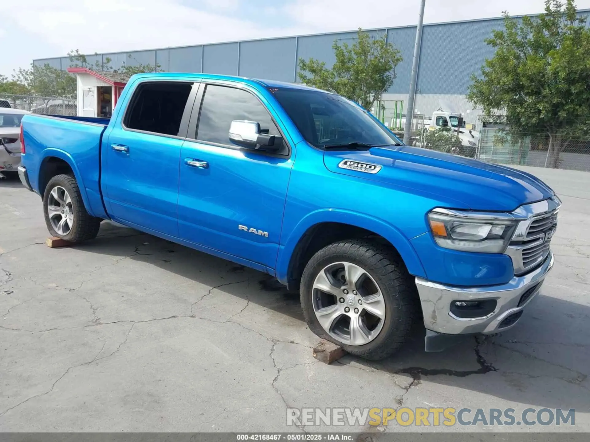 1 Photograph of a damaged car 1C6SRFJT0NN352135 RAM 1500 2022