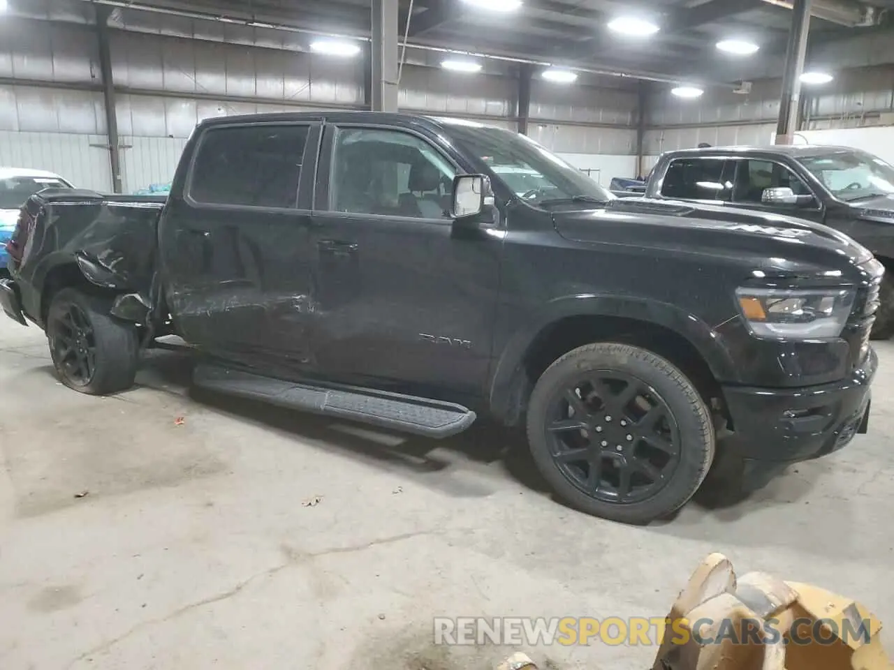 4 Photograph of a damaged car 1C6SRFJT0NN474798 RAM 1500 2022