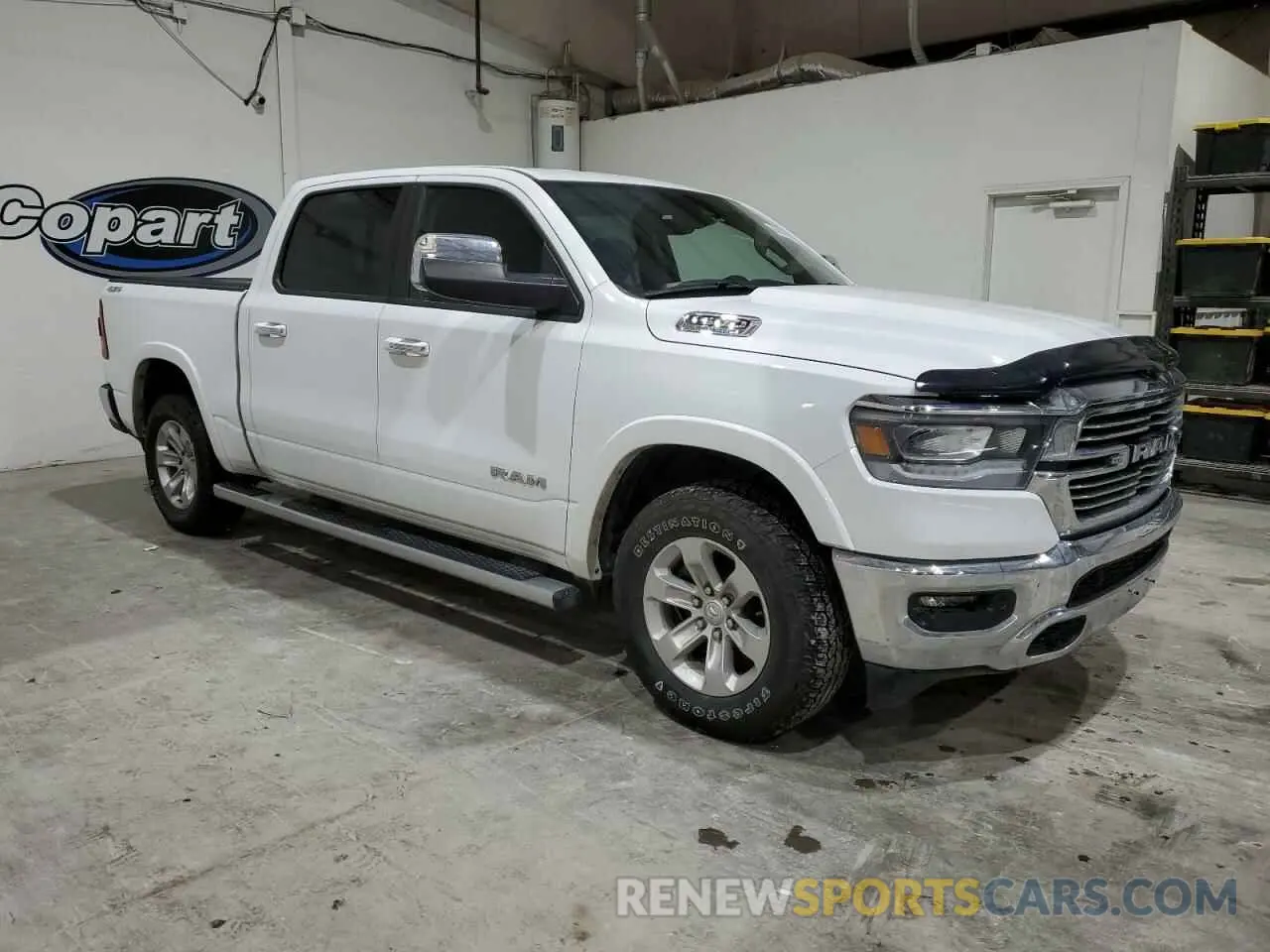 4 Photograph of a damaged car 1C6SRFJT1NN269099 RAM 1500 2022