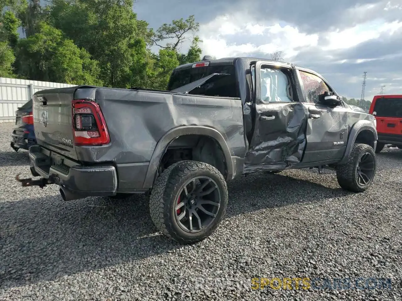 3 Photograph of a damaged car 1C6SRFJT2NN310923 RAM 1500 2022