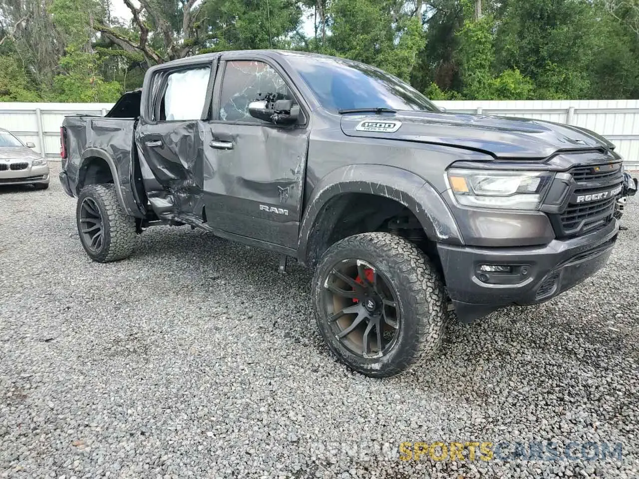 4 Photograph of a damaged car 1C6SRFJT2NN310923 RAM 1500 2022