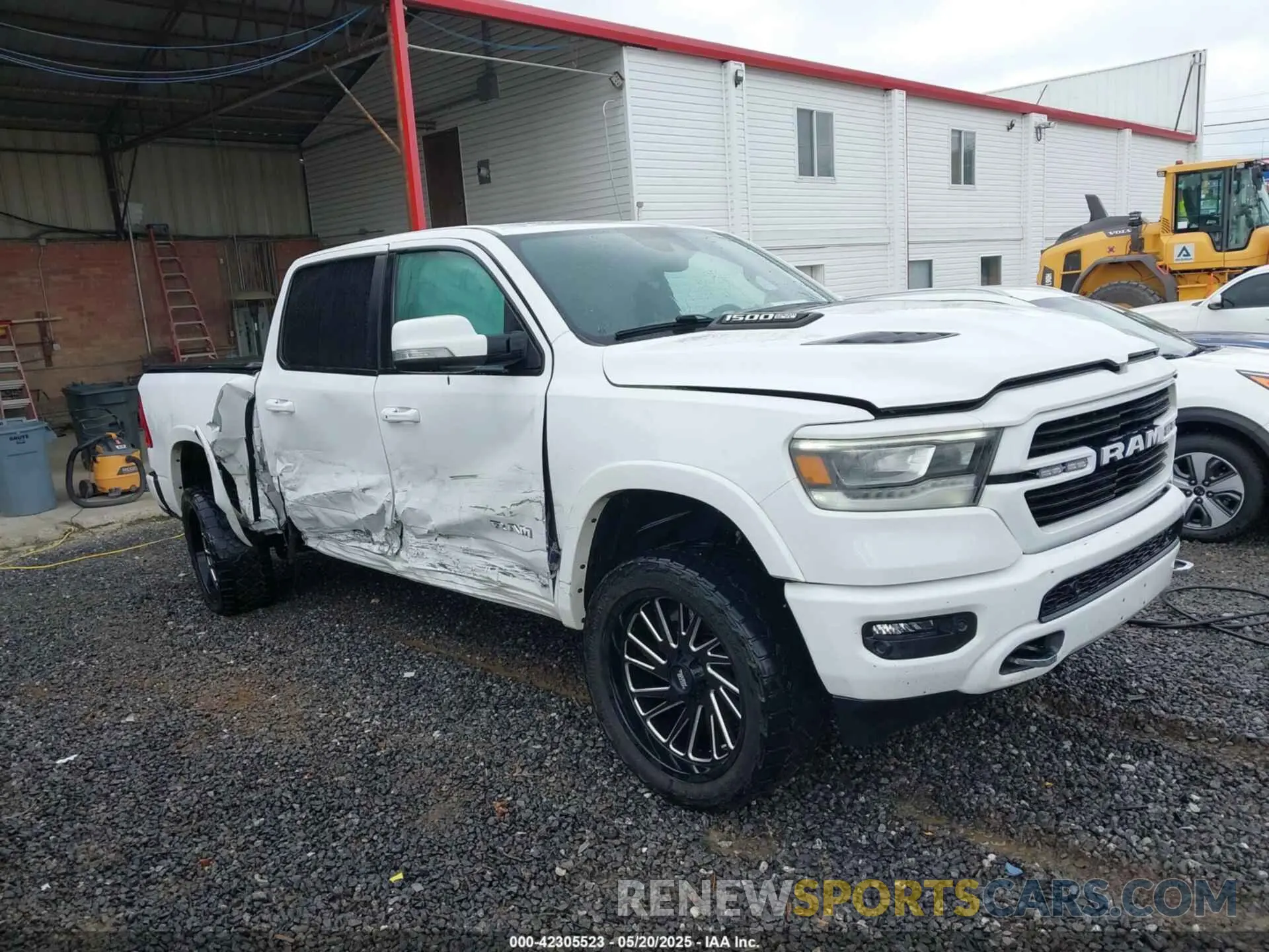 1 Photograph of a damaged car 1C6SRFJT3NN323521 RAM 1500 2022