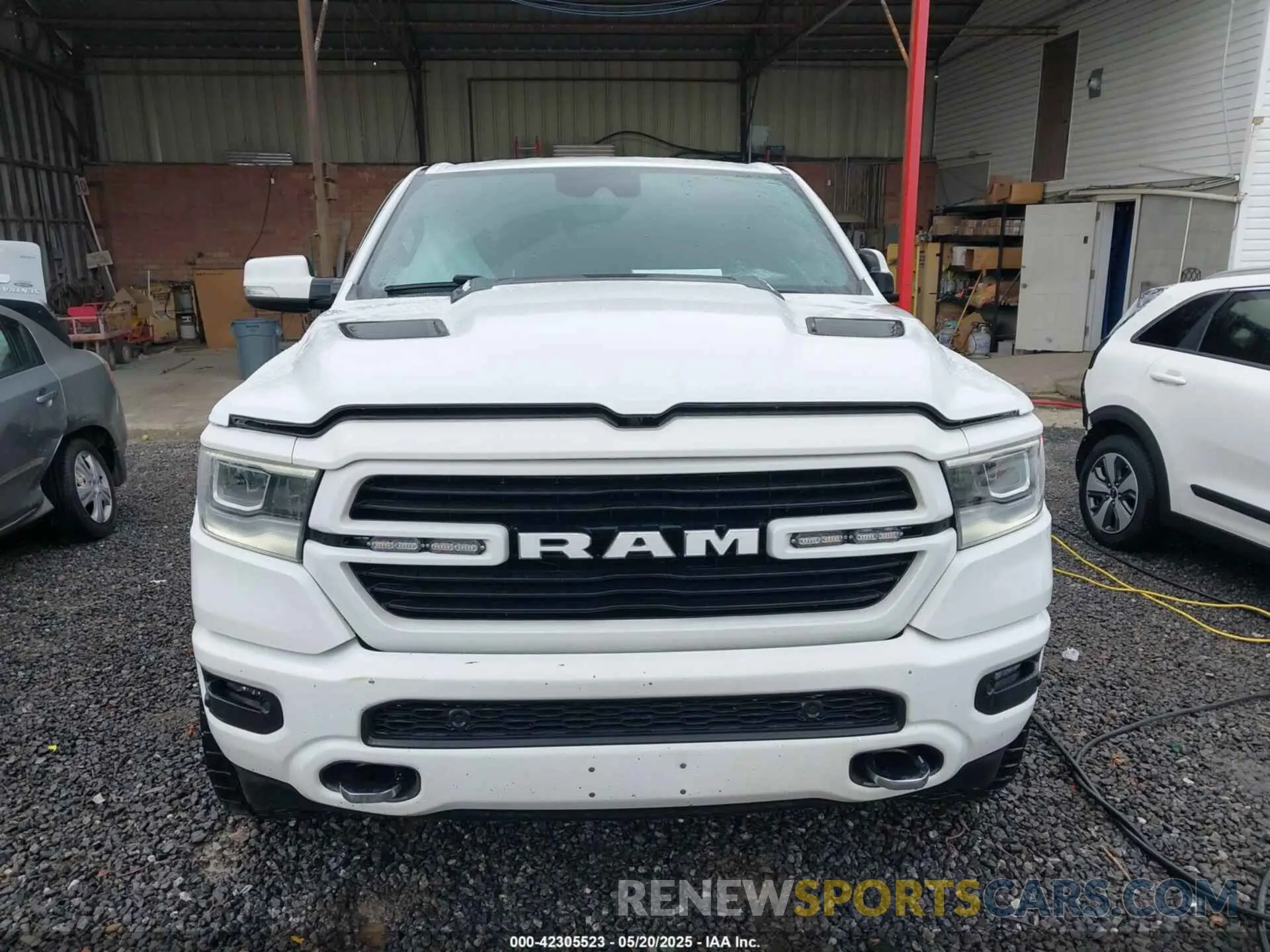 12 Photograph of a damaged car 1C6SRFJT3NN323521 RAM 1500 2022