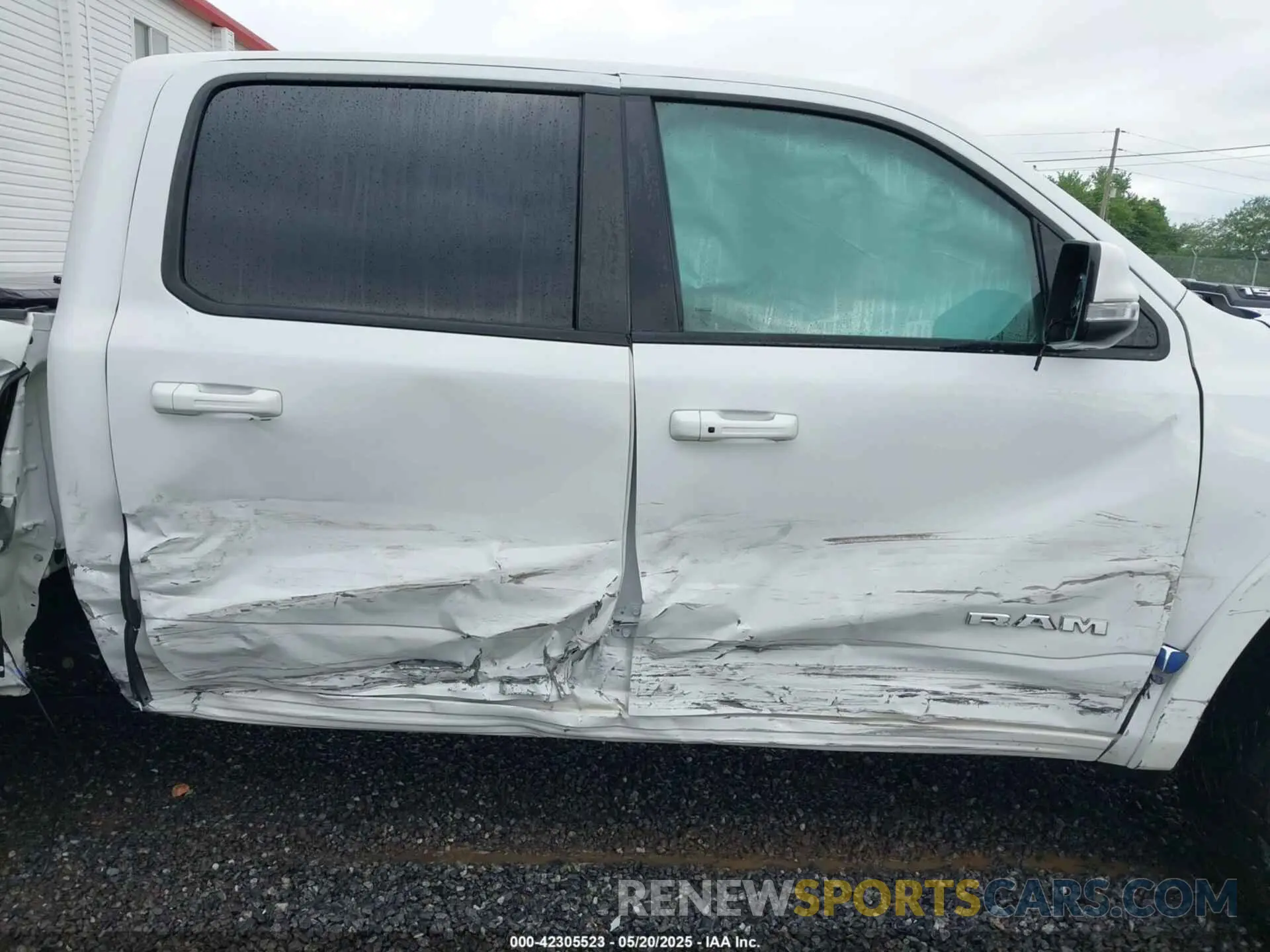 13 Photograph of a damaged car 1C6SRFJT3NN323521 RAM 1500 2022