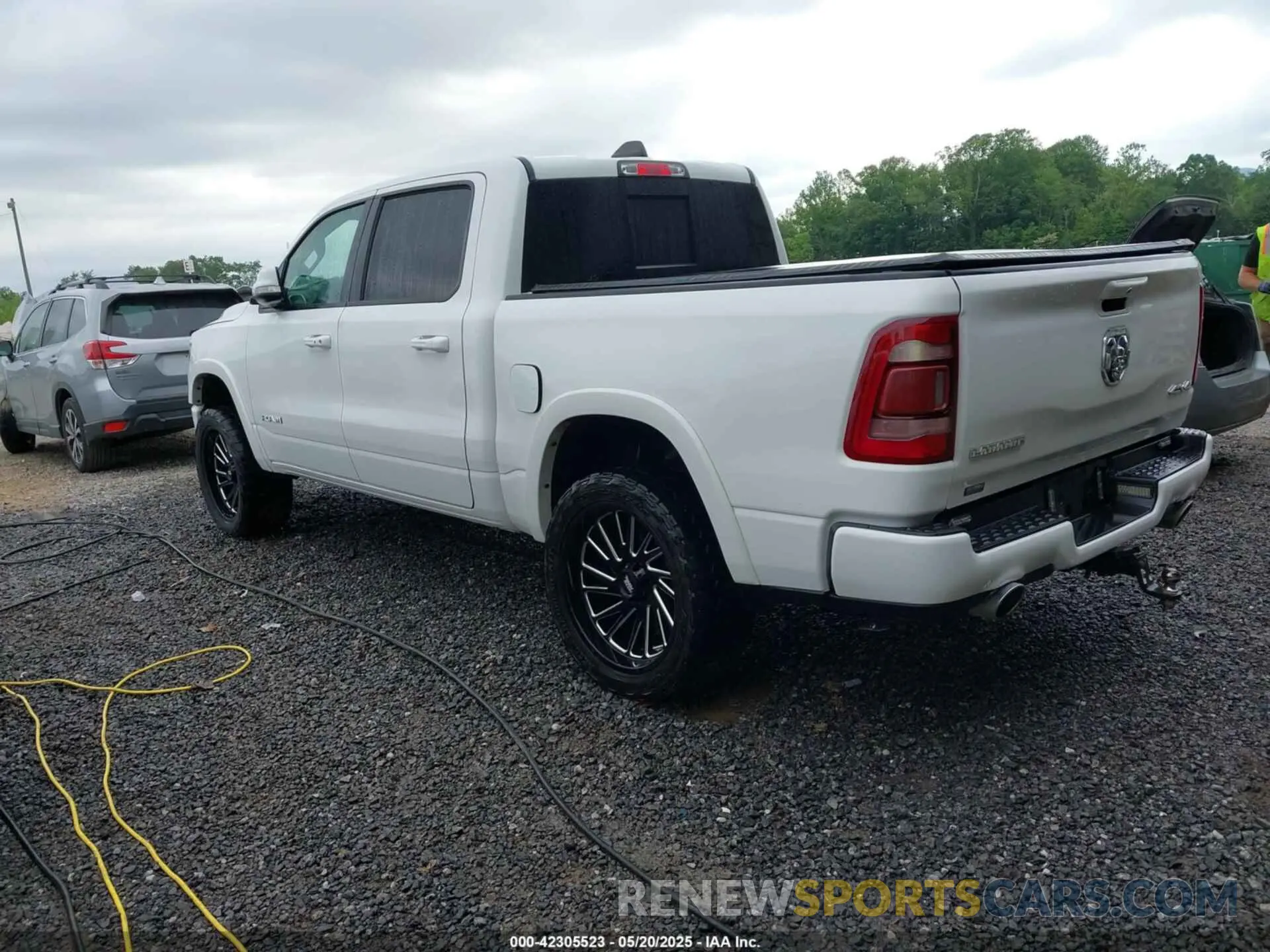3 Photograph of a damaged car 1C6SRFJT3NN323521 RAM 1500 2022